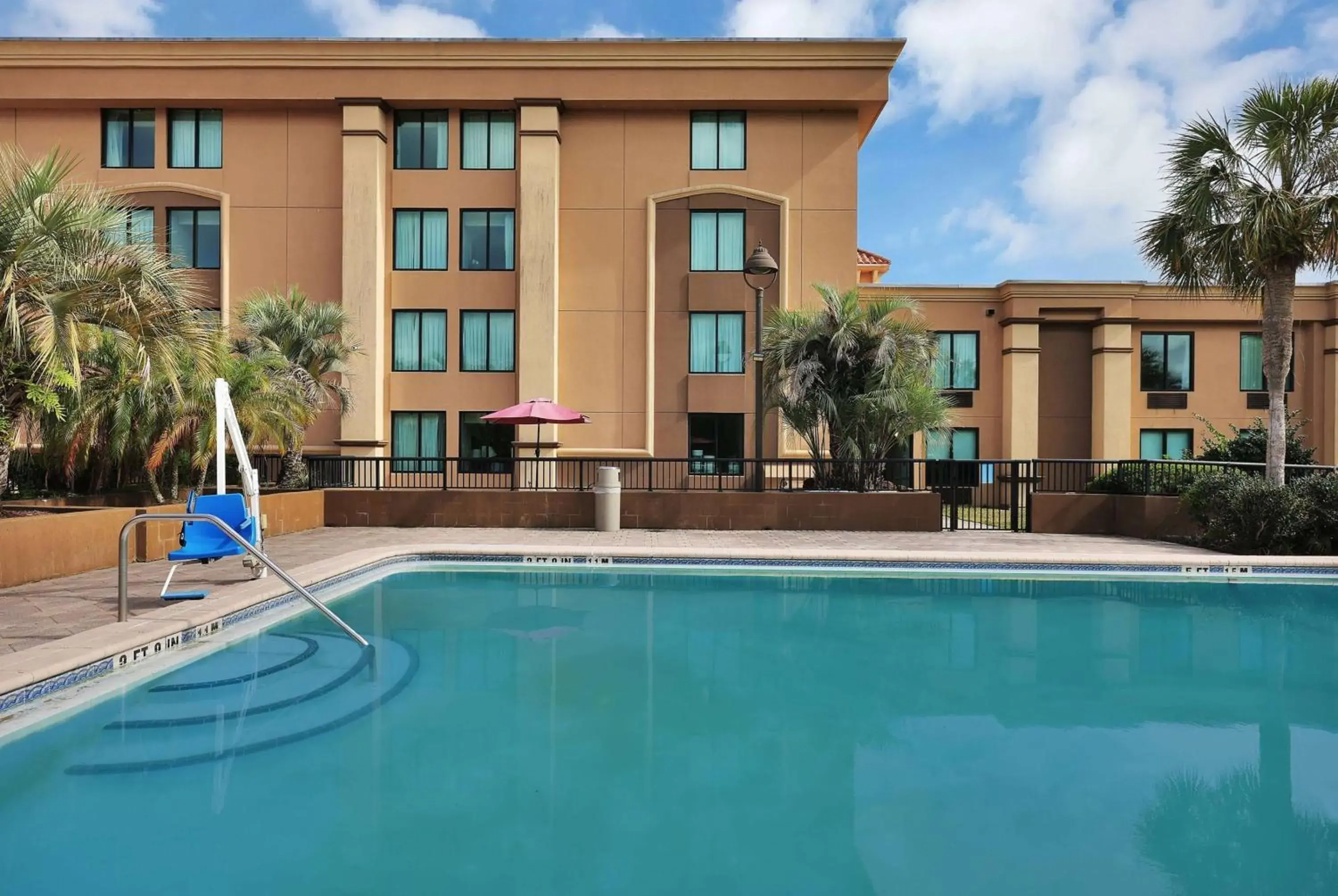 Pool view, Swimming Pool in Ramada by Wyndham Jacksonville I-95 by Butler Blvd