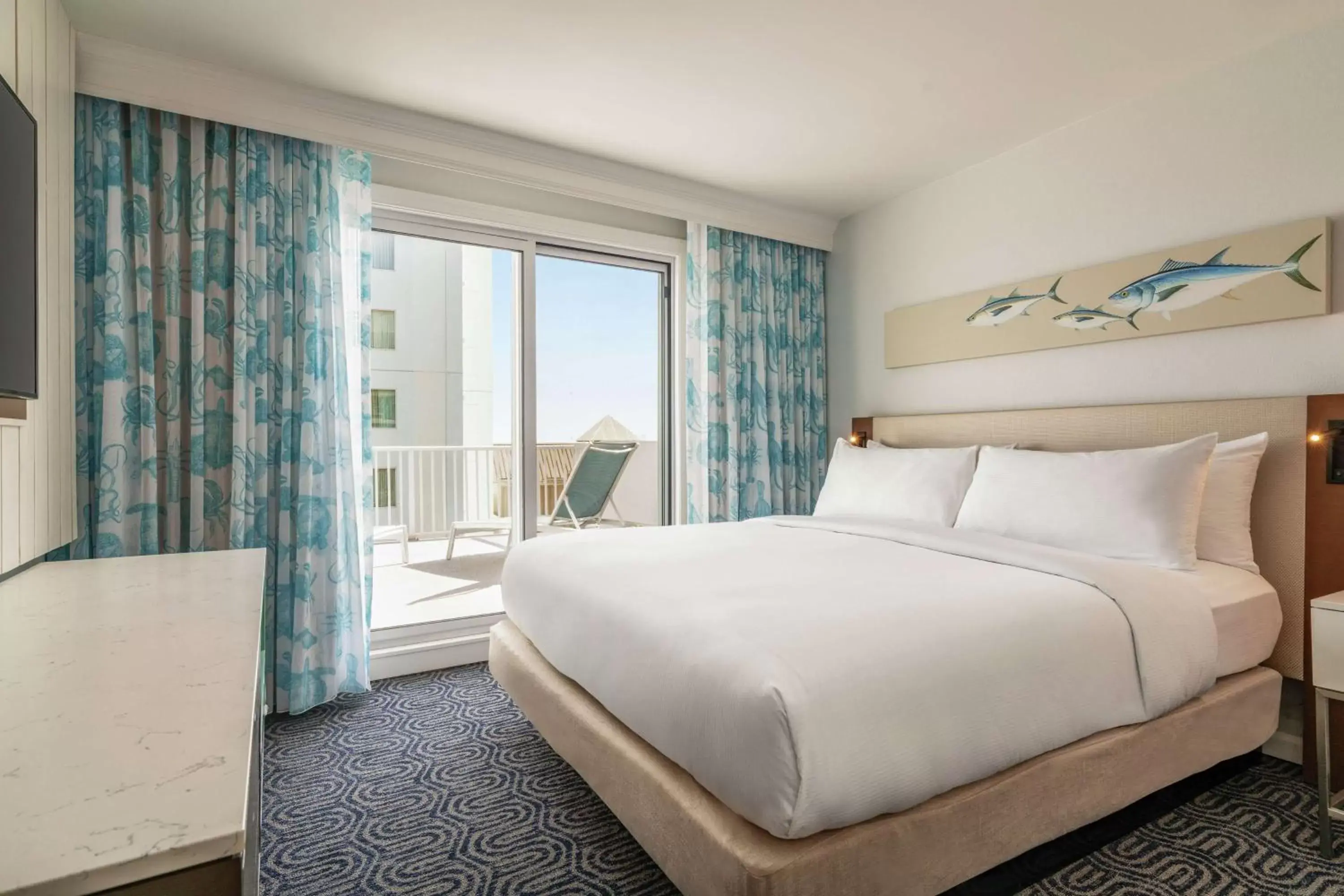 Bed in DoubleTree by Hilton Ocean City Oceanfront