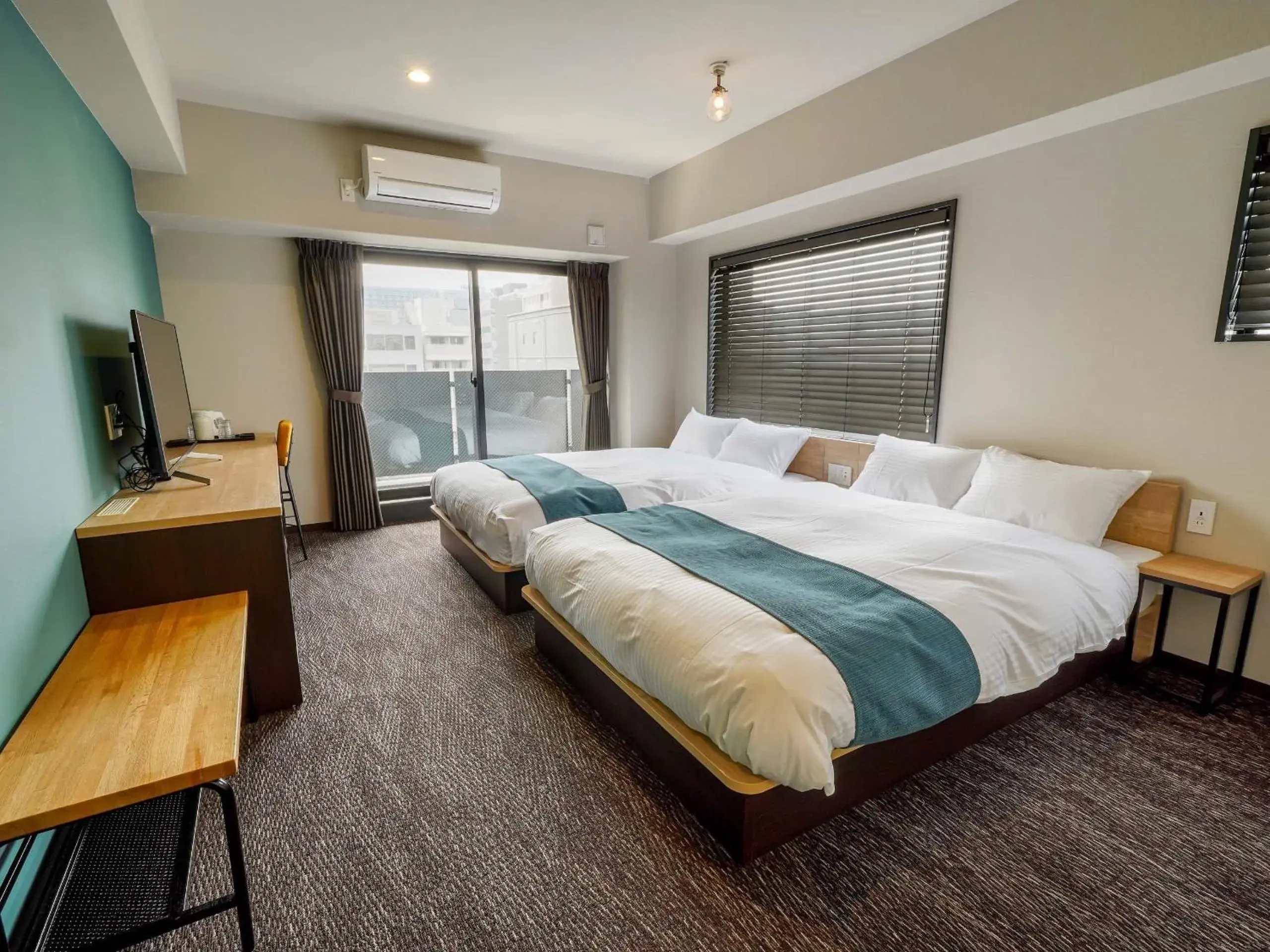 Bed in RESI STAY cotorune KYOTO