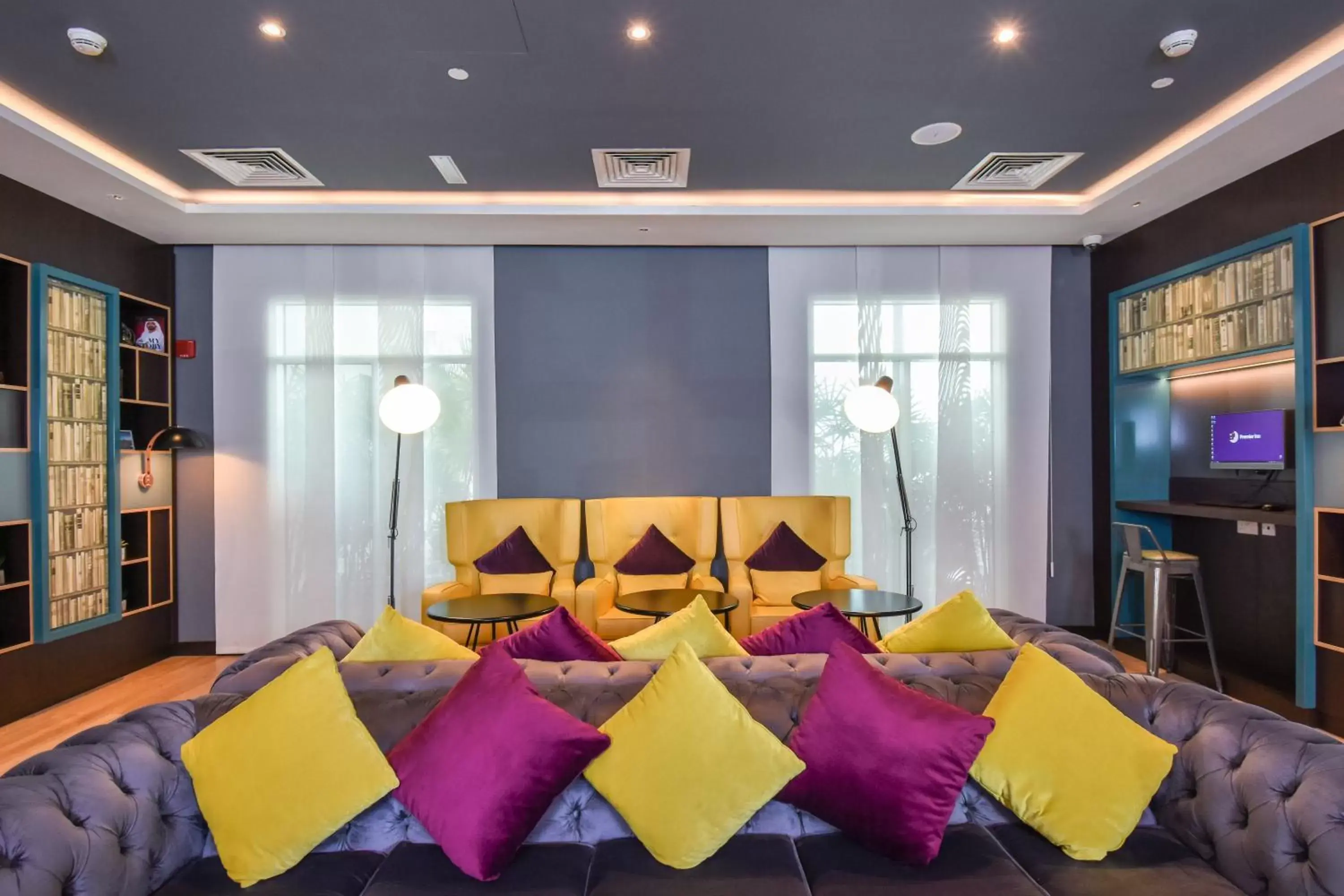 Communal lounge/ TV room in Premier Inn Dubai Investments Park