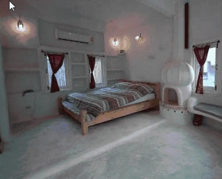 Bed in Scenic Riverside Resort