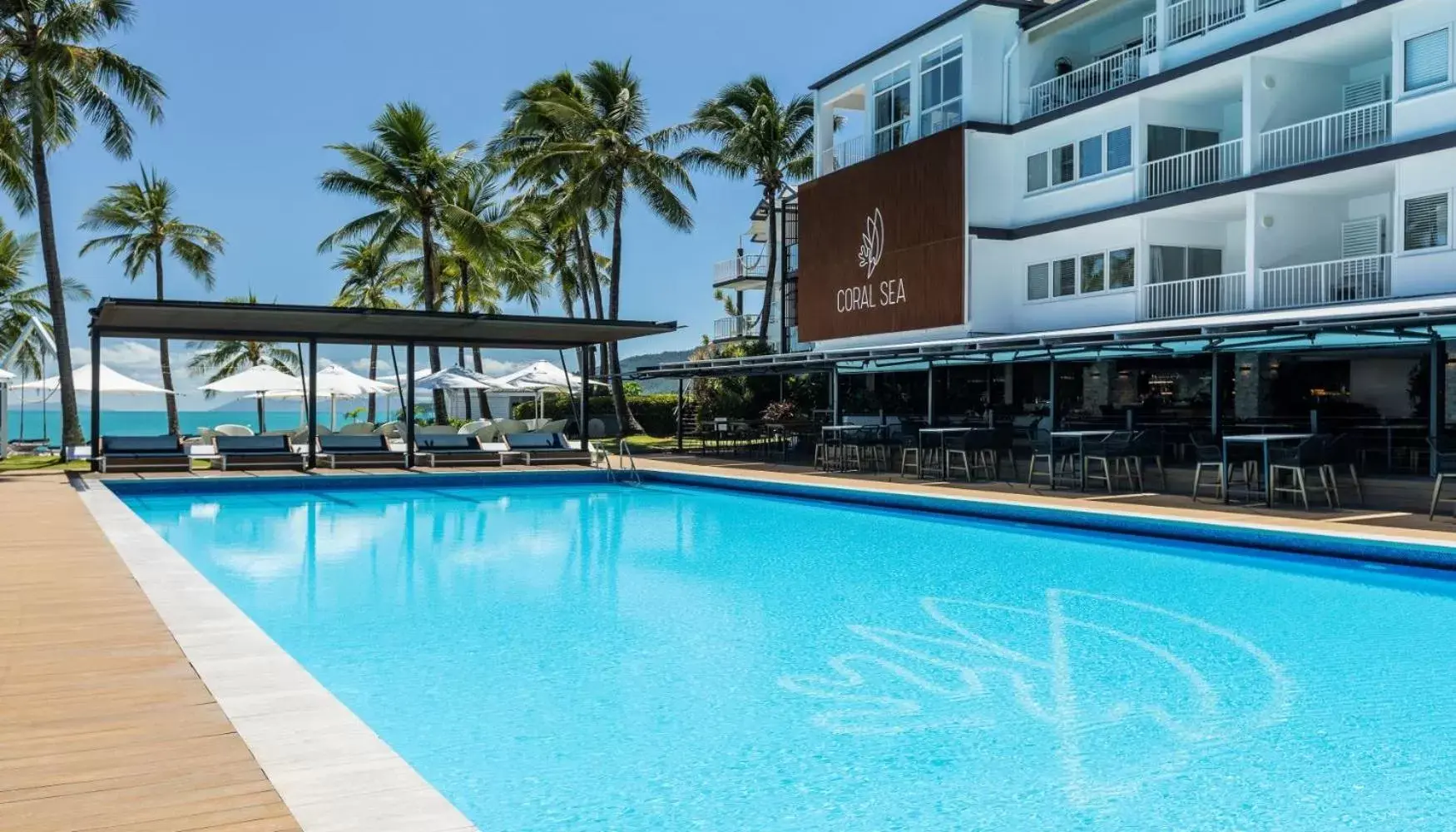 Property building, Swimming Pool in Coral Sea Marina Resort