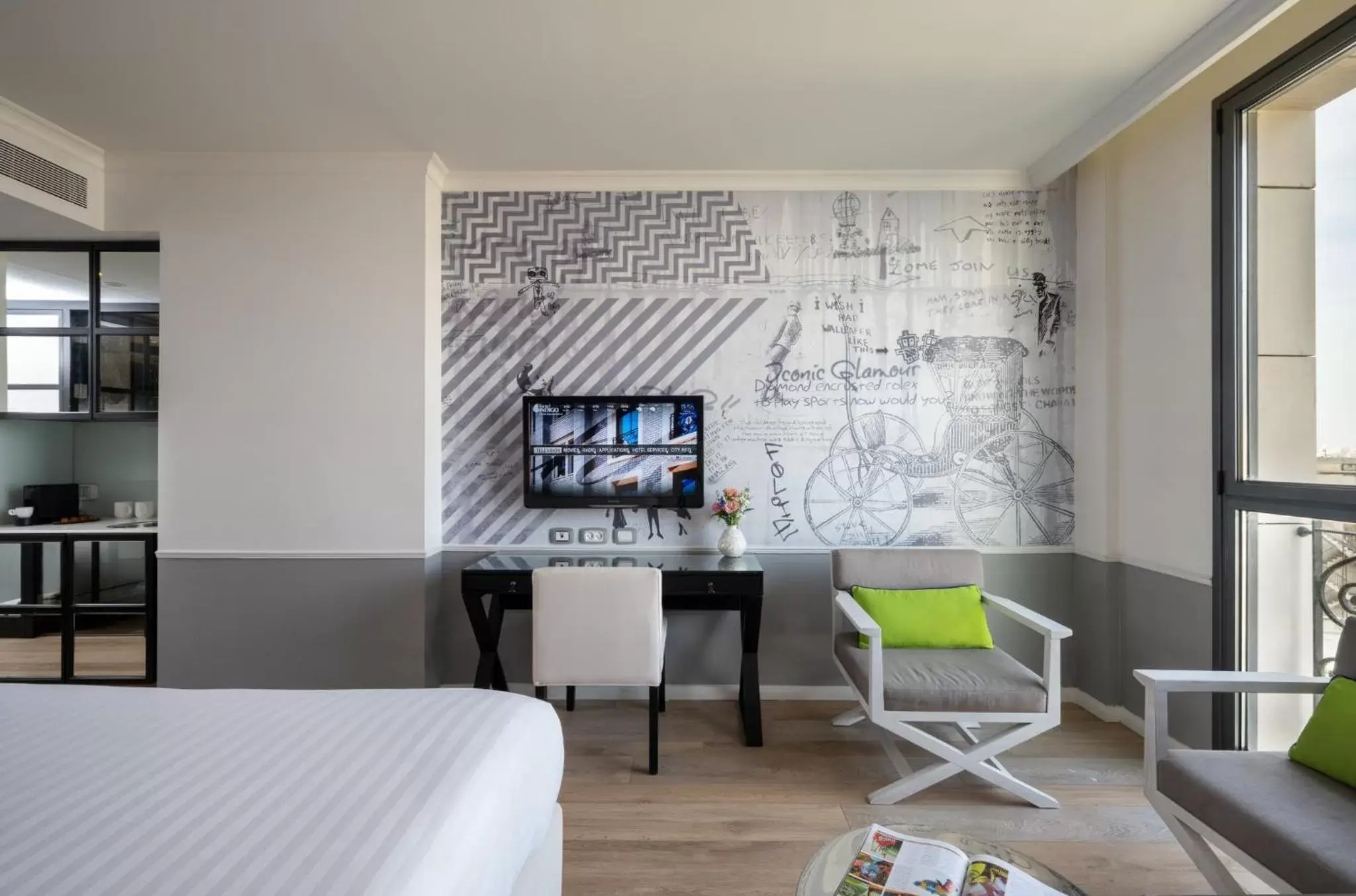 Photo of the whole room, TV/Entertainment Center in Hotel Indigo Tel Aviv - Diamond District, an IHG Hotel