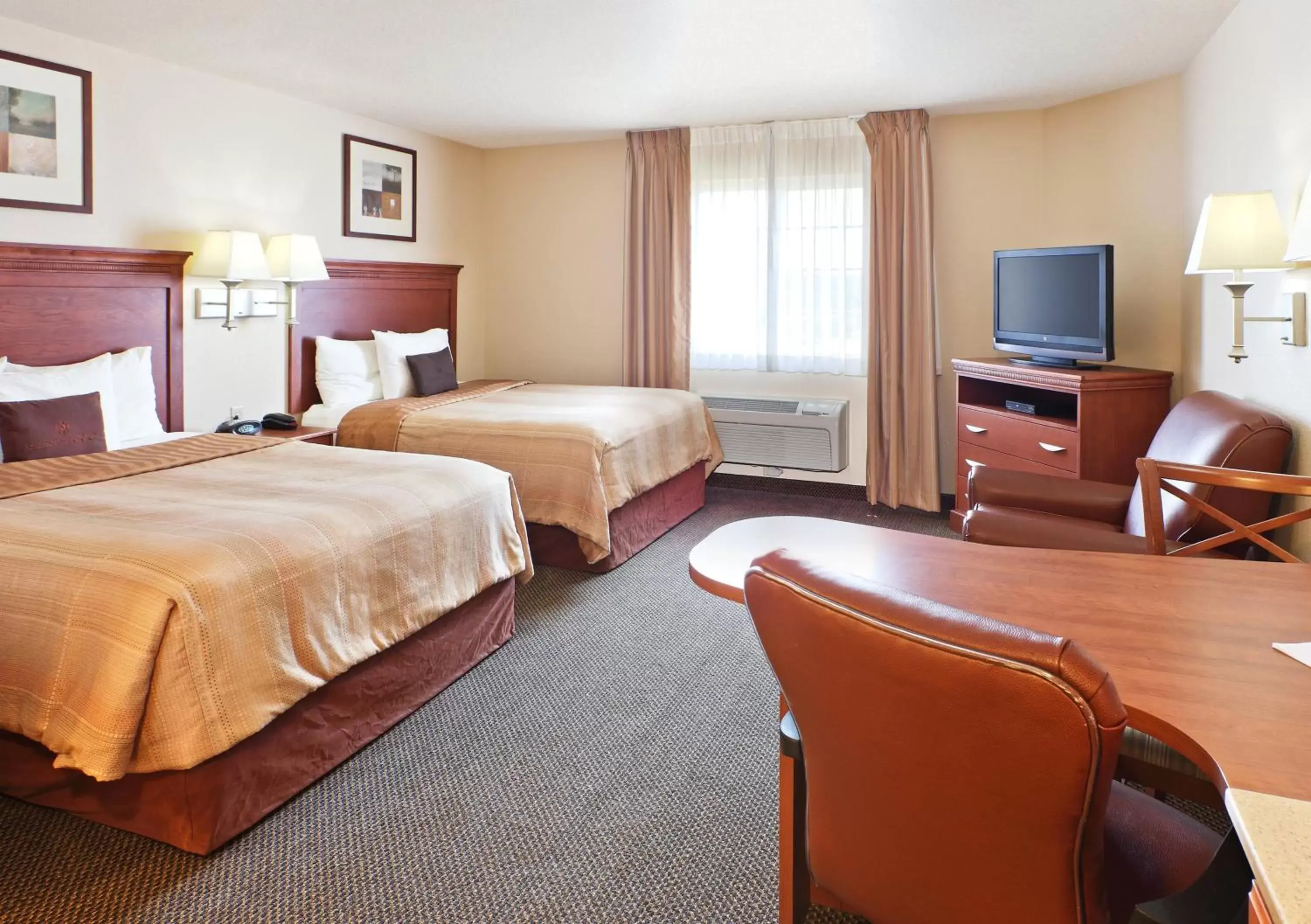 Photo of the whole room, TV/Entertainment Center in Candlewood Suites Fayetteville, an IHG Hotel