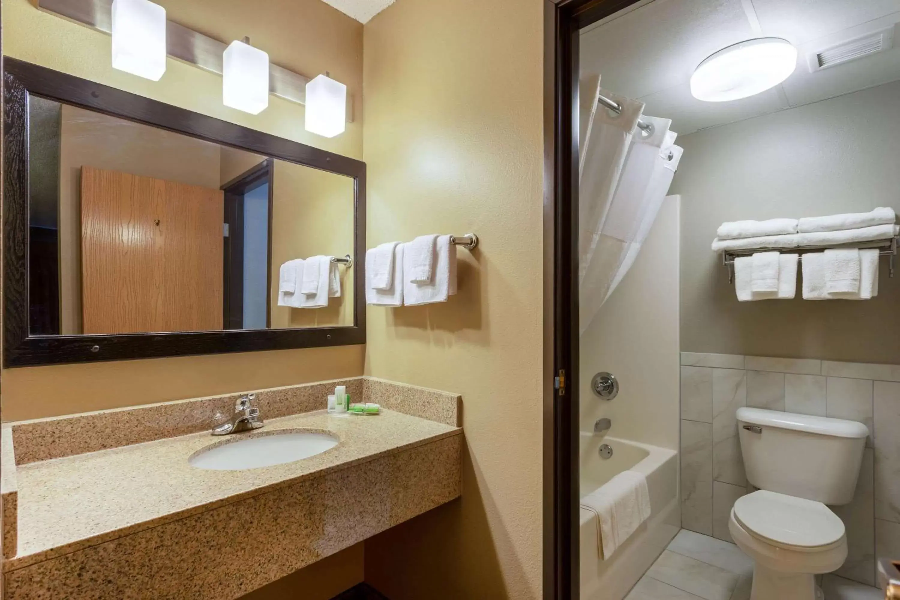 Bathroom in AmericInn by Wyndham Hartford WI