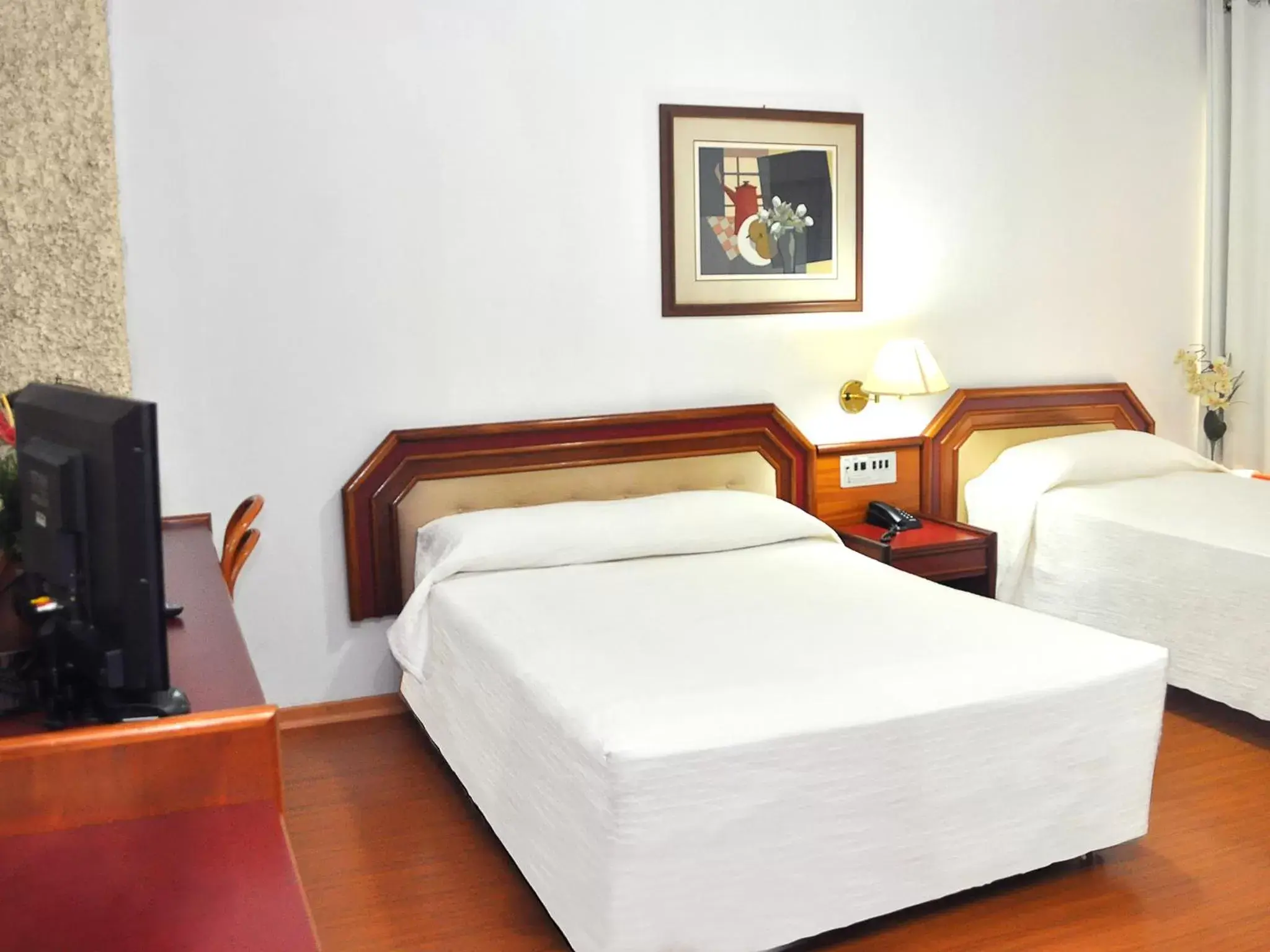 Bed in Caravelle Palace Hotel