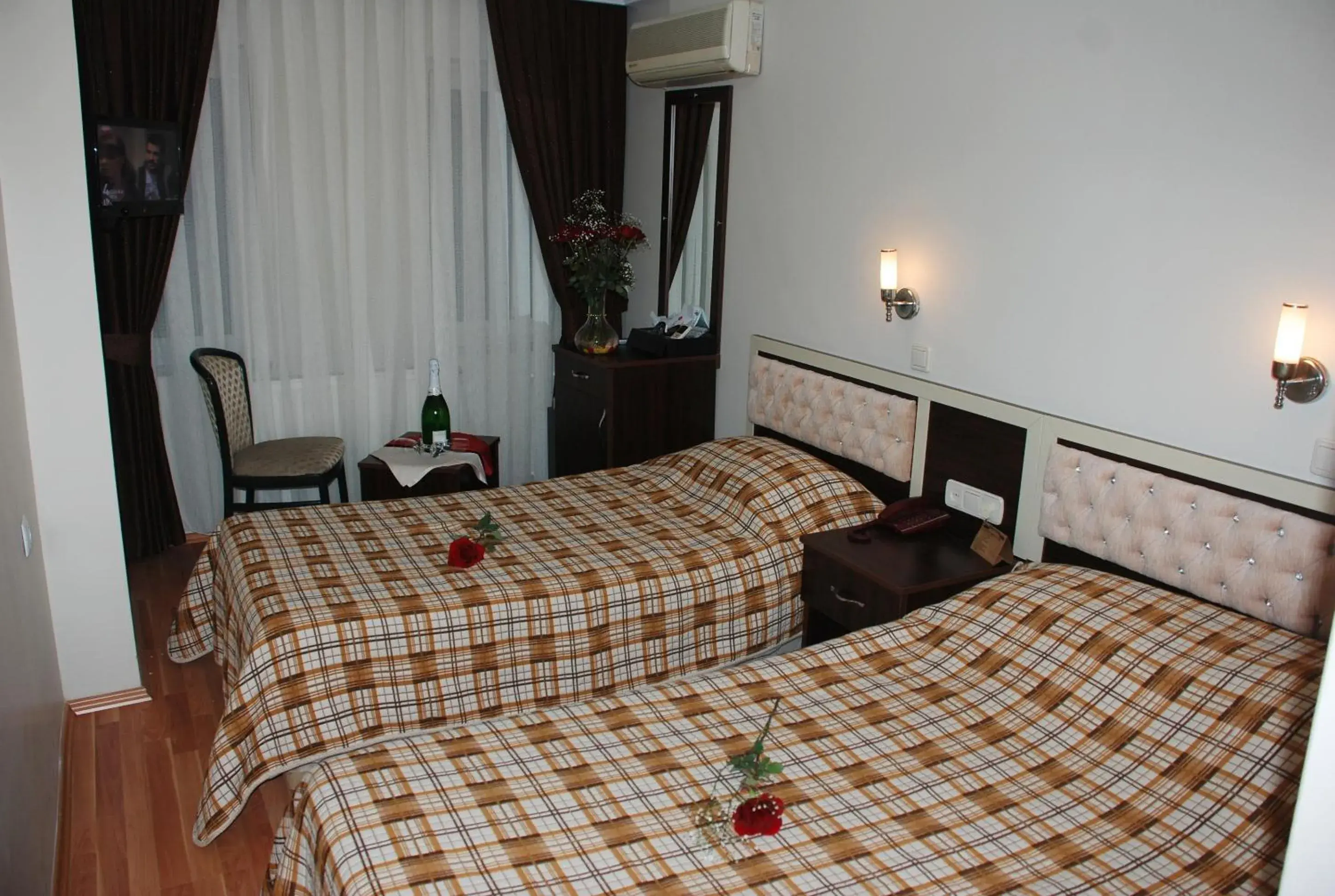 Bed in Grand Mark Hotel