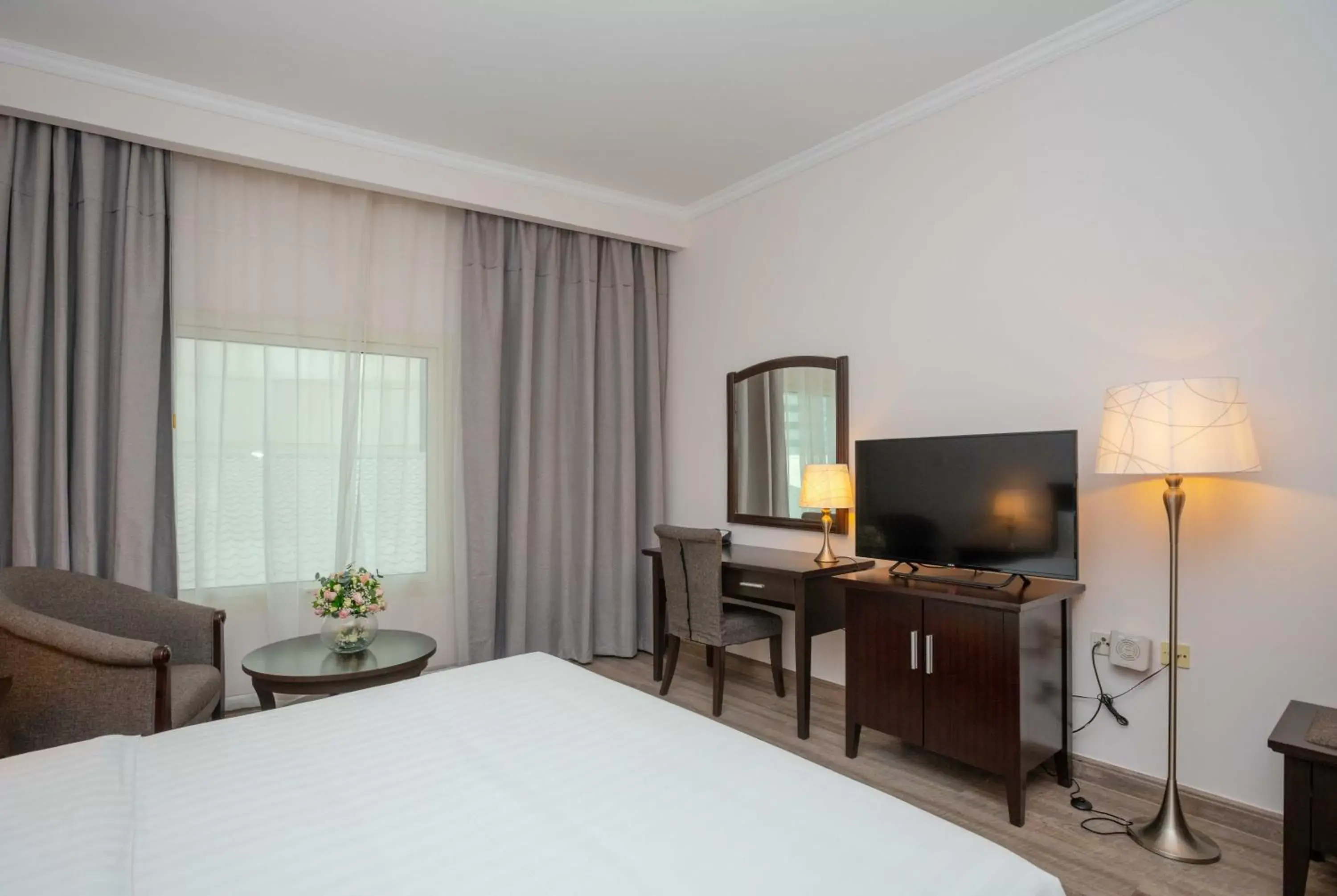 Bedroom, TV/Entertainment Center in Ezdan Hotels Doha