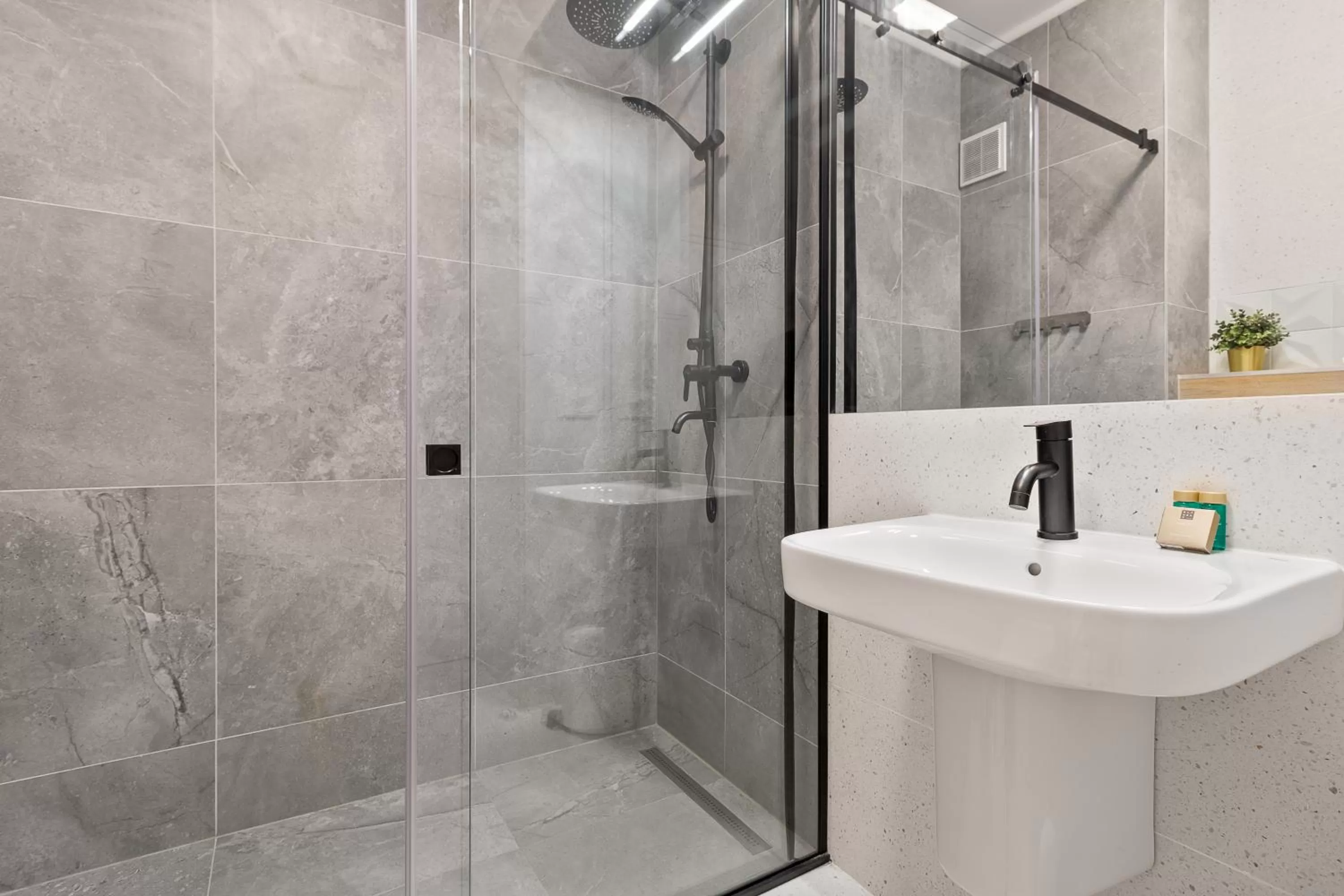 Shower in Prima by the River