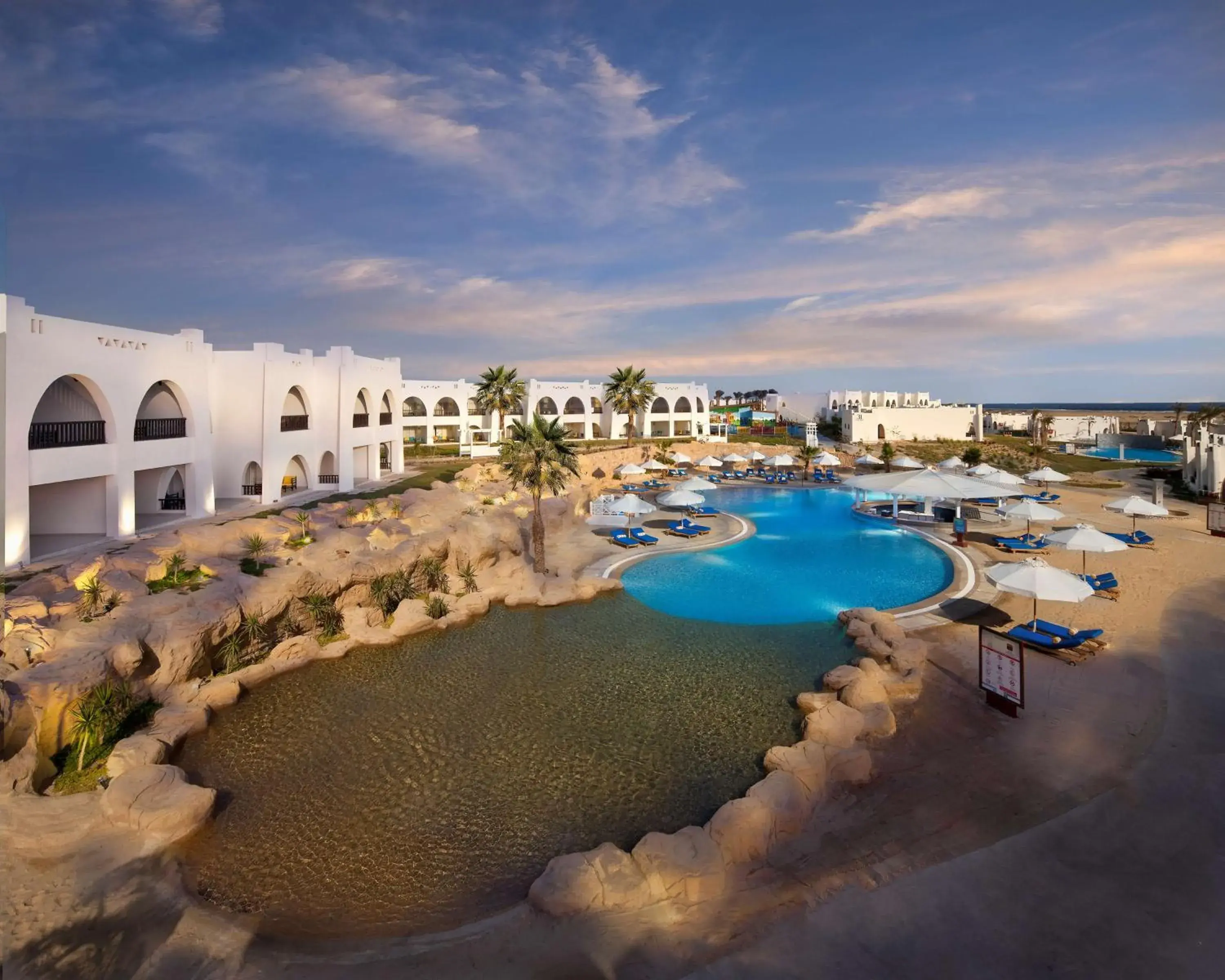 Pool view in Hilton Marsa Alam Nubian Resort Pool view in Hilton Marsa Alam Nubian Resort