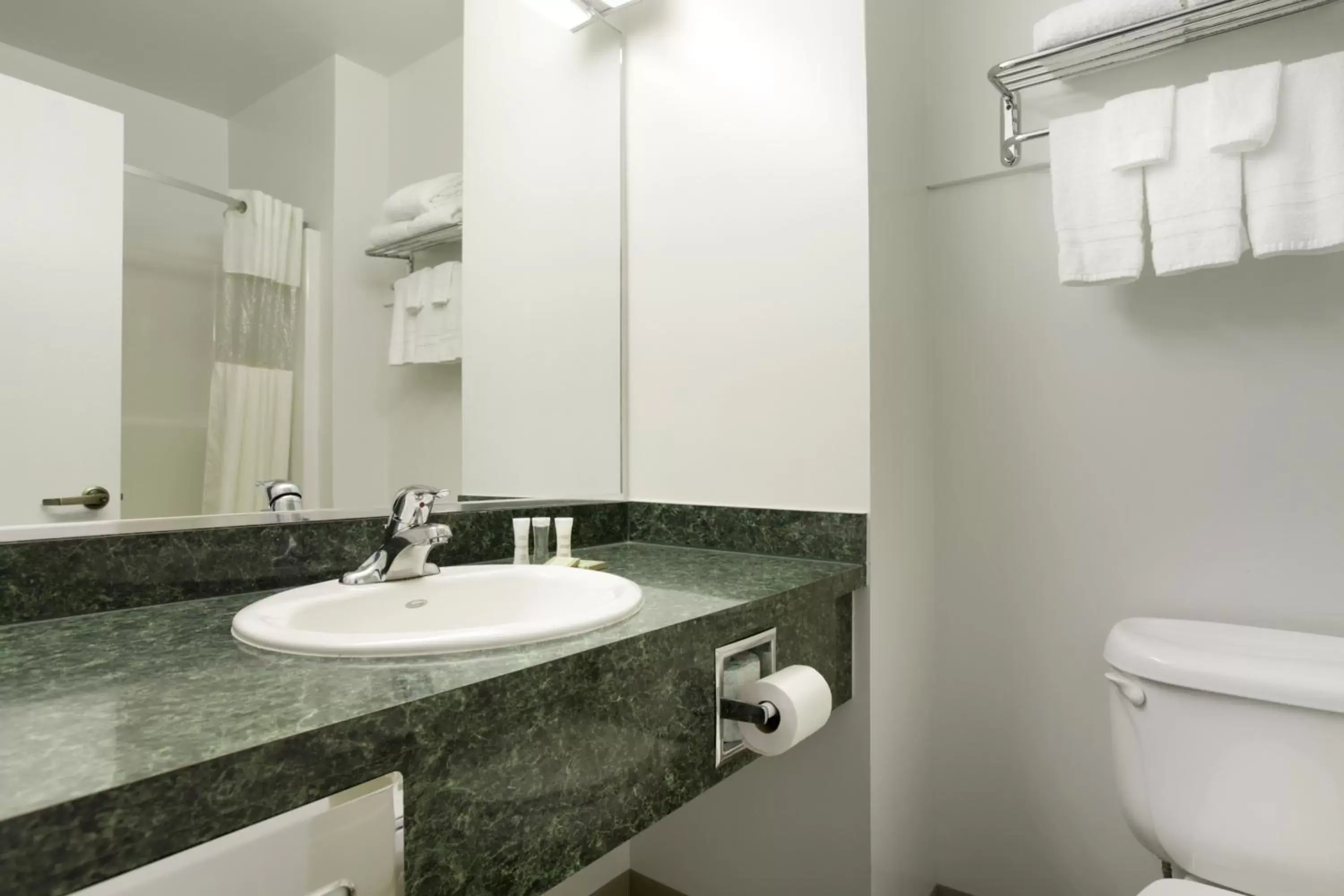 Bathroom in Super 8 by Wyndham Central Pt Medford