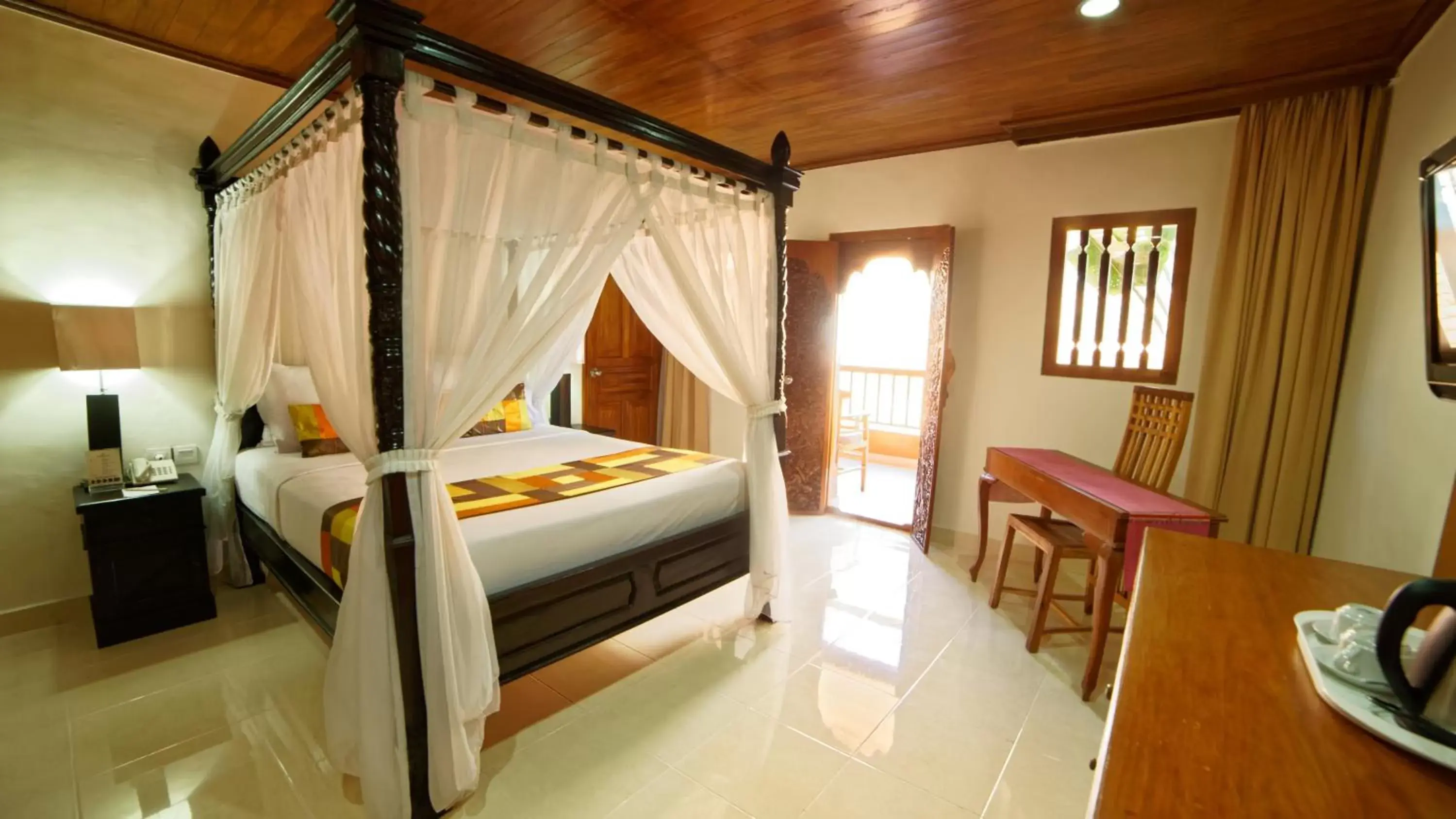 Bed in Wina Holiday Villa Kuta Bali