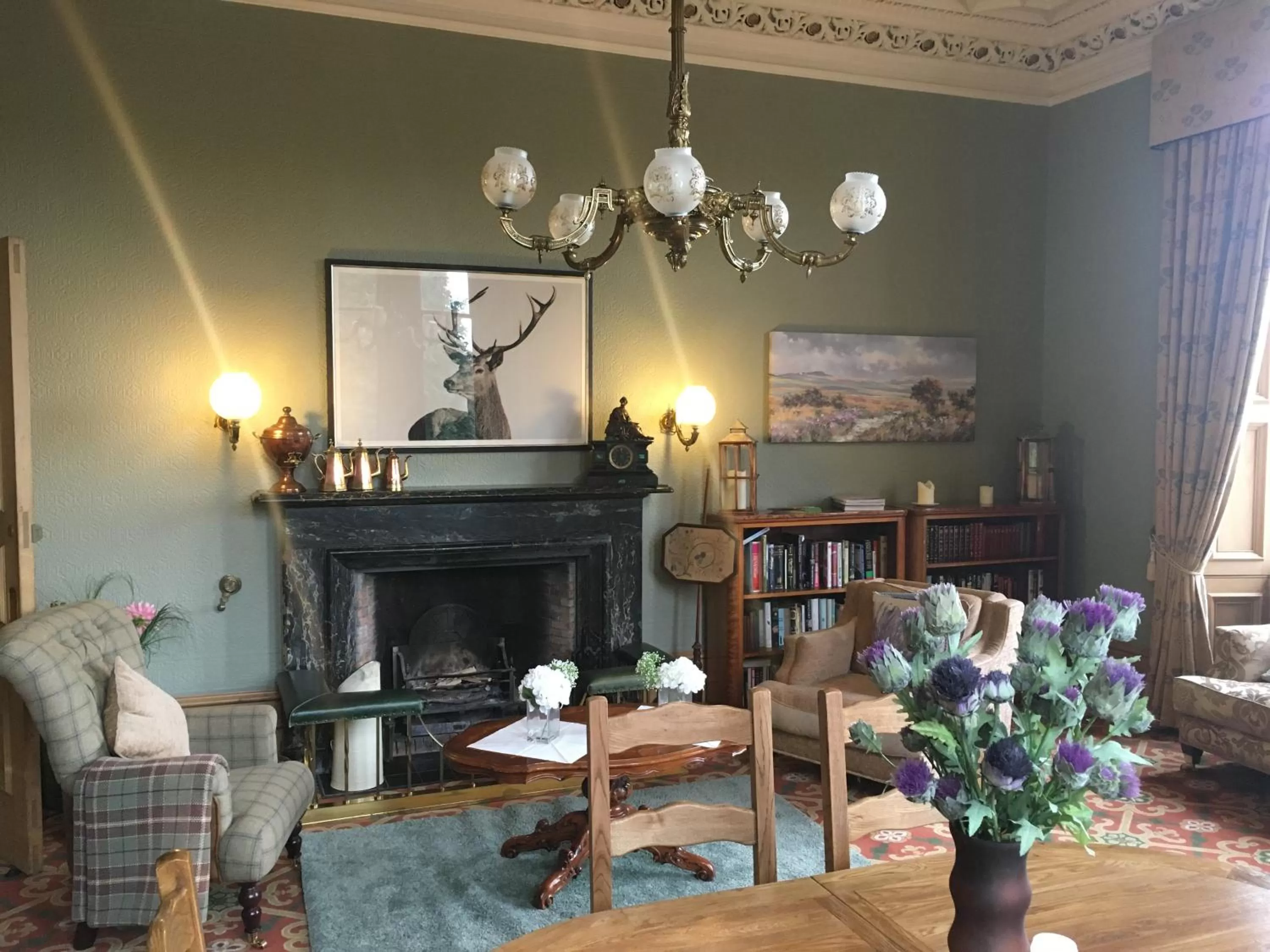 Communal lounge/ TV room in Mansfield House Hotel