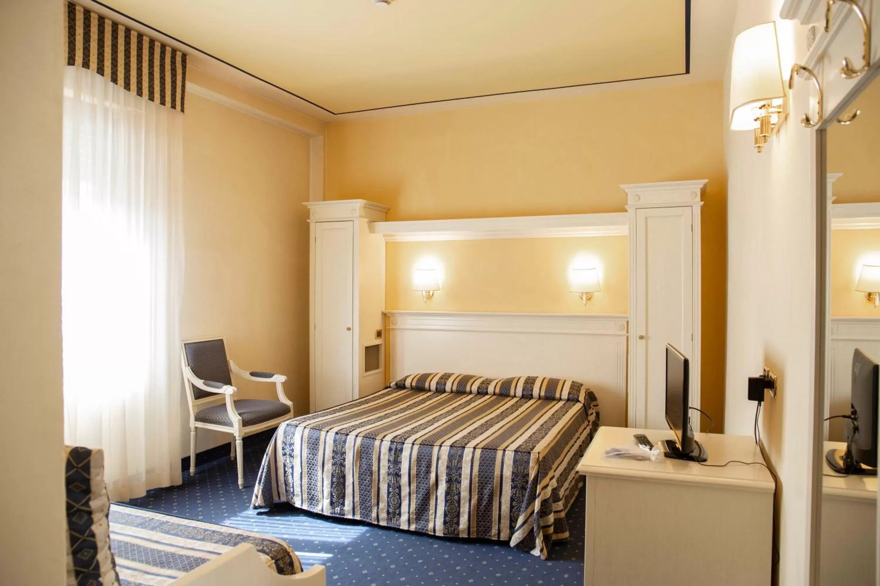 Bed in Albergo Milano