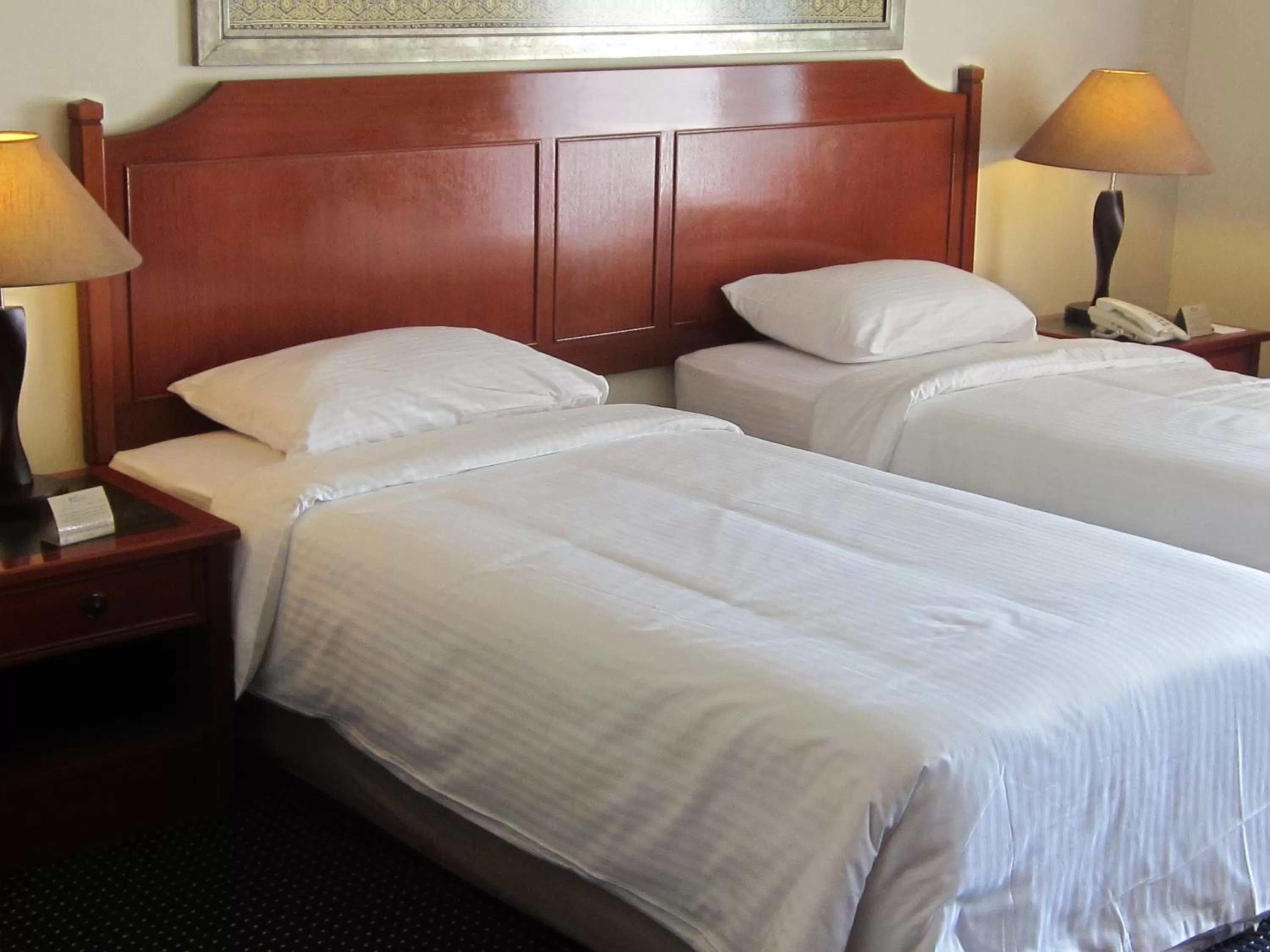 Bed in Rainbow Paradise Beach Resort