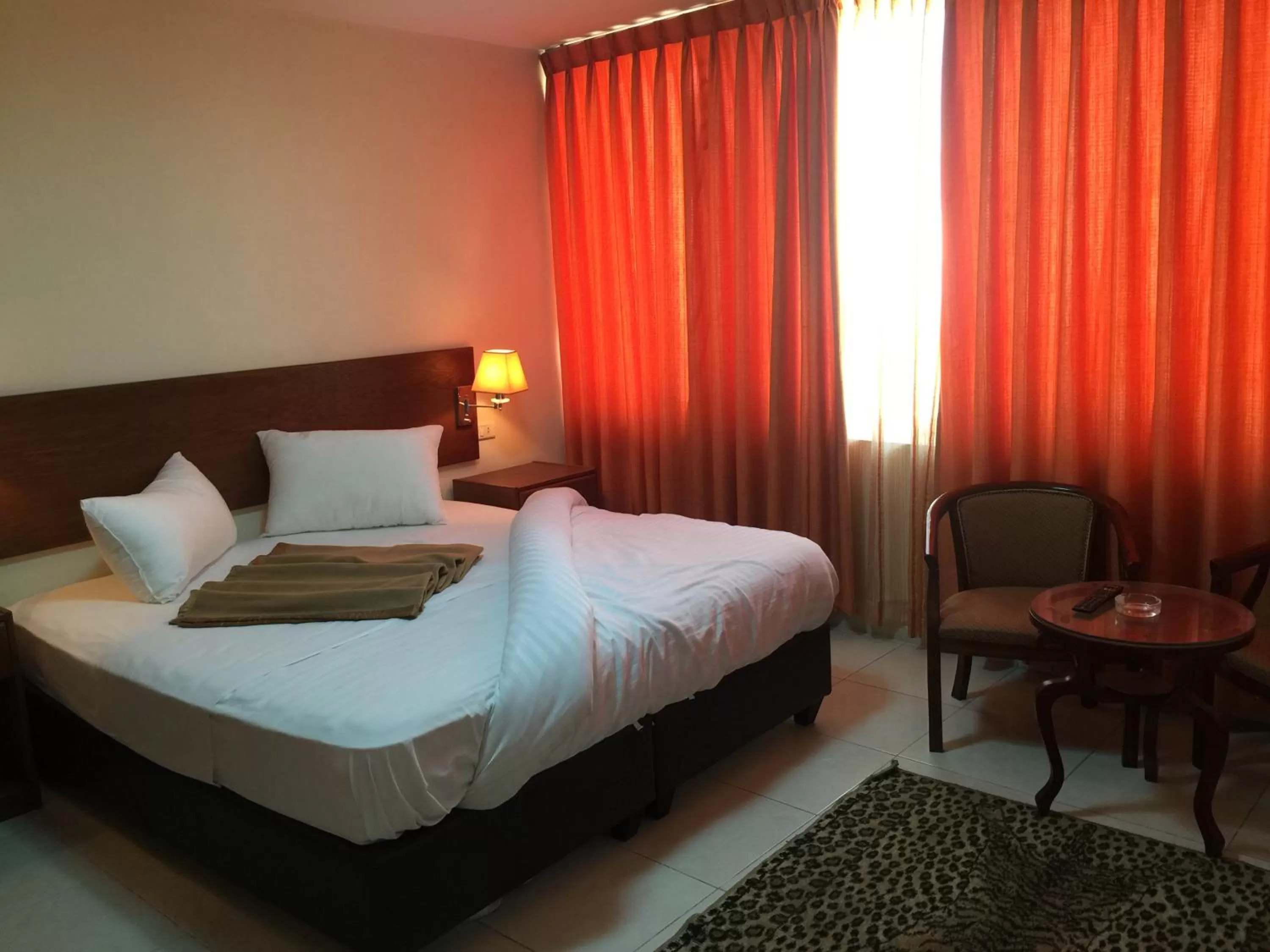 Bed in Zaina Plaza Hotel