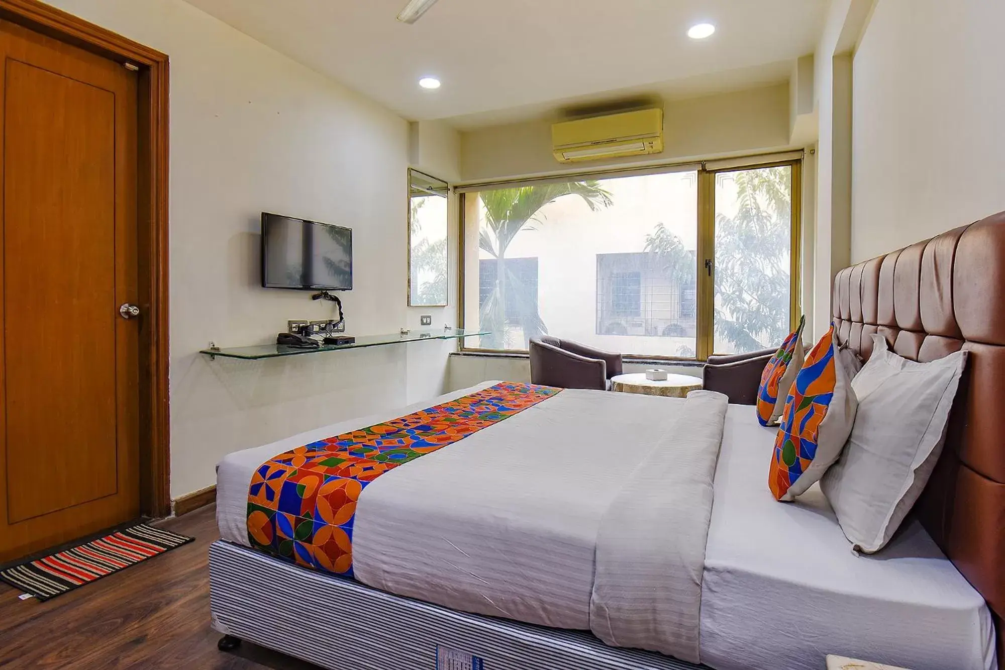 Bed in FabHotel SR Wakad - Nr Mall of Millenium Bed in FabHotel SR Wakad - Nr Mall of Millenium