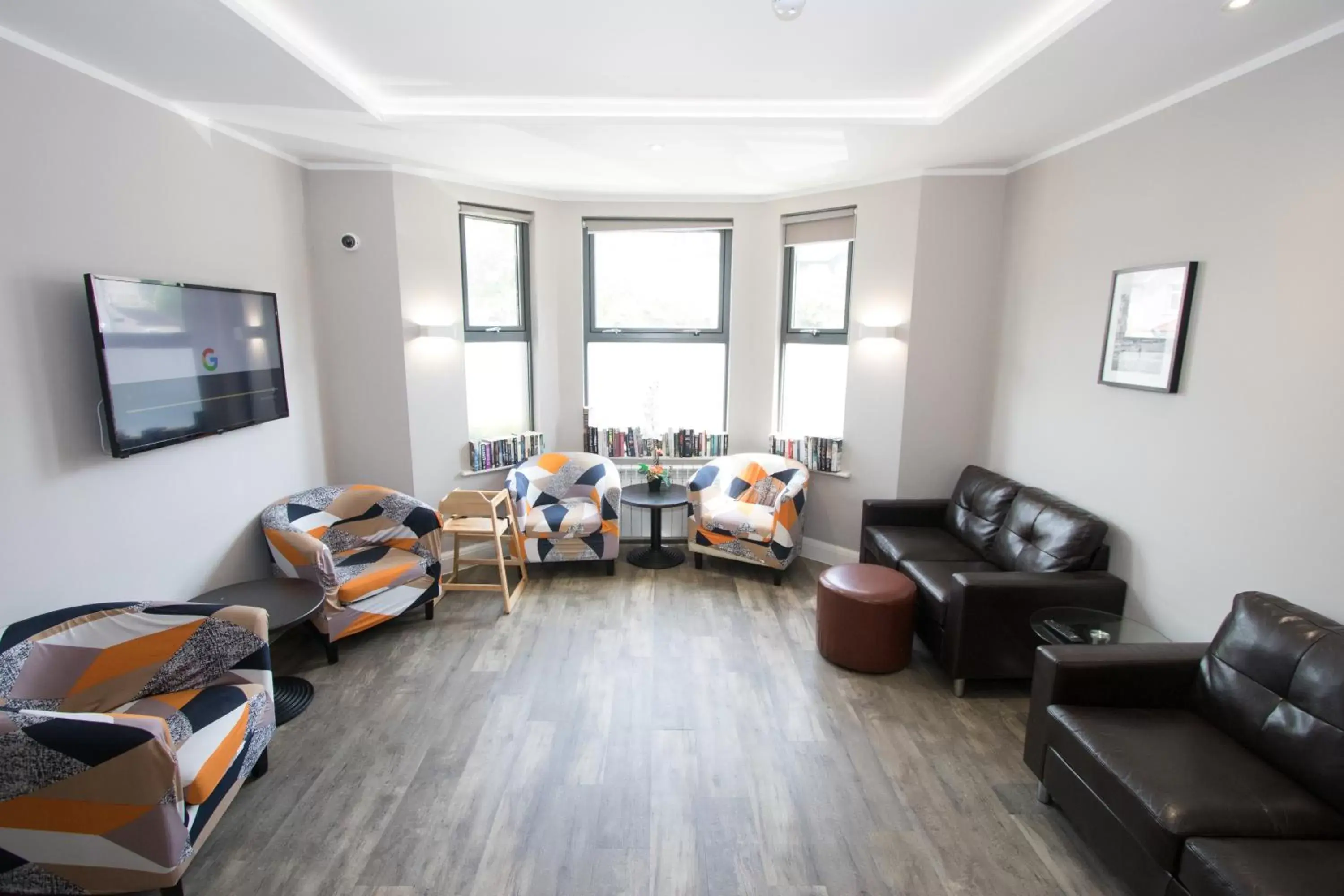 Communal lounge/ TV room in Westciti Caroco Aparthotel