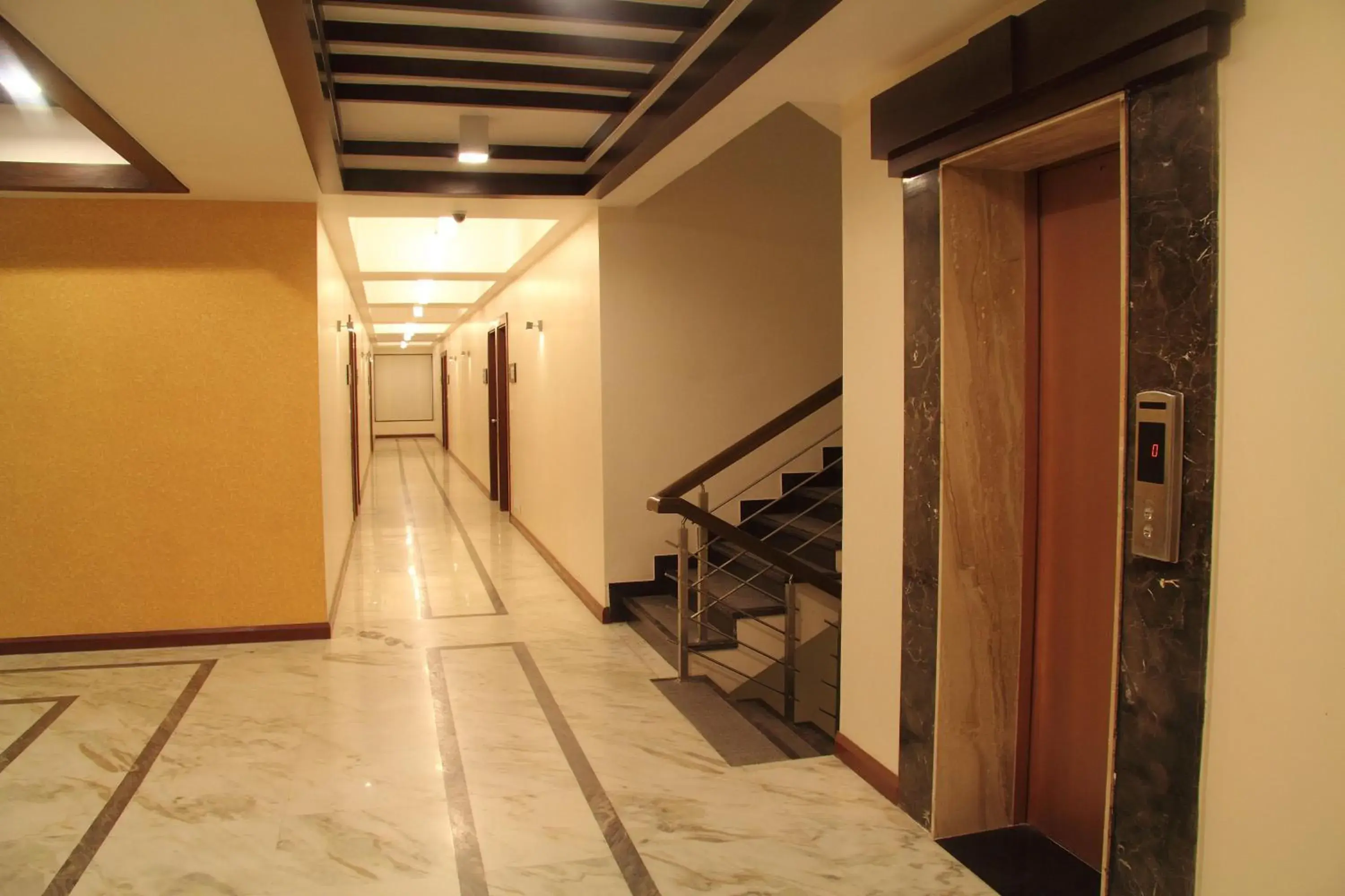 Lobby or reception, Balcony/Terrace in Amantra Comfort Hotel
