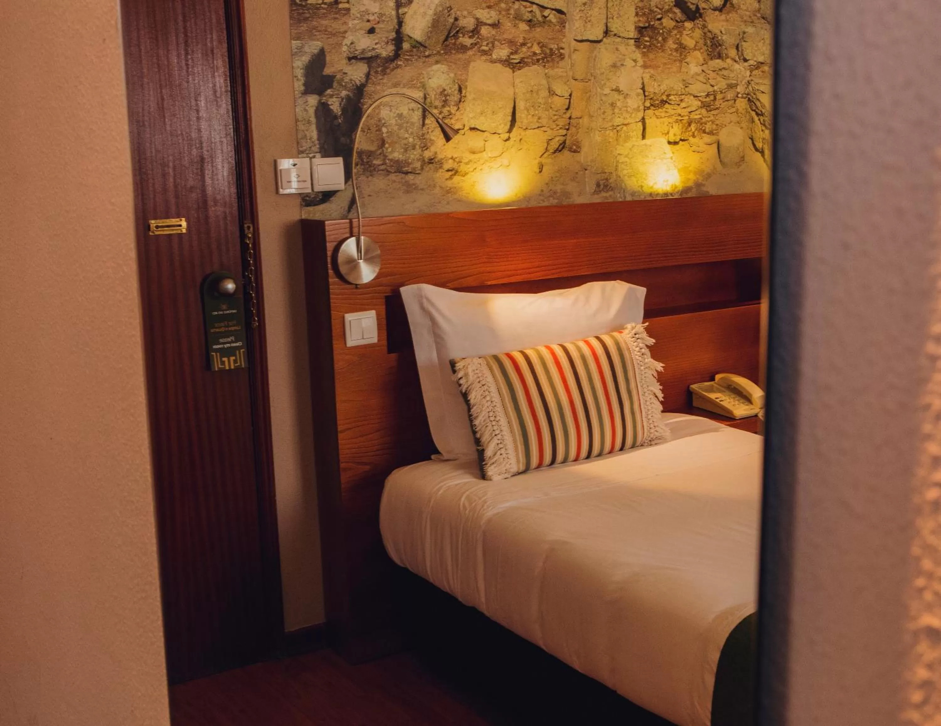 Bed in Hotel Império do Rei