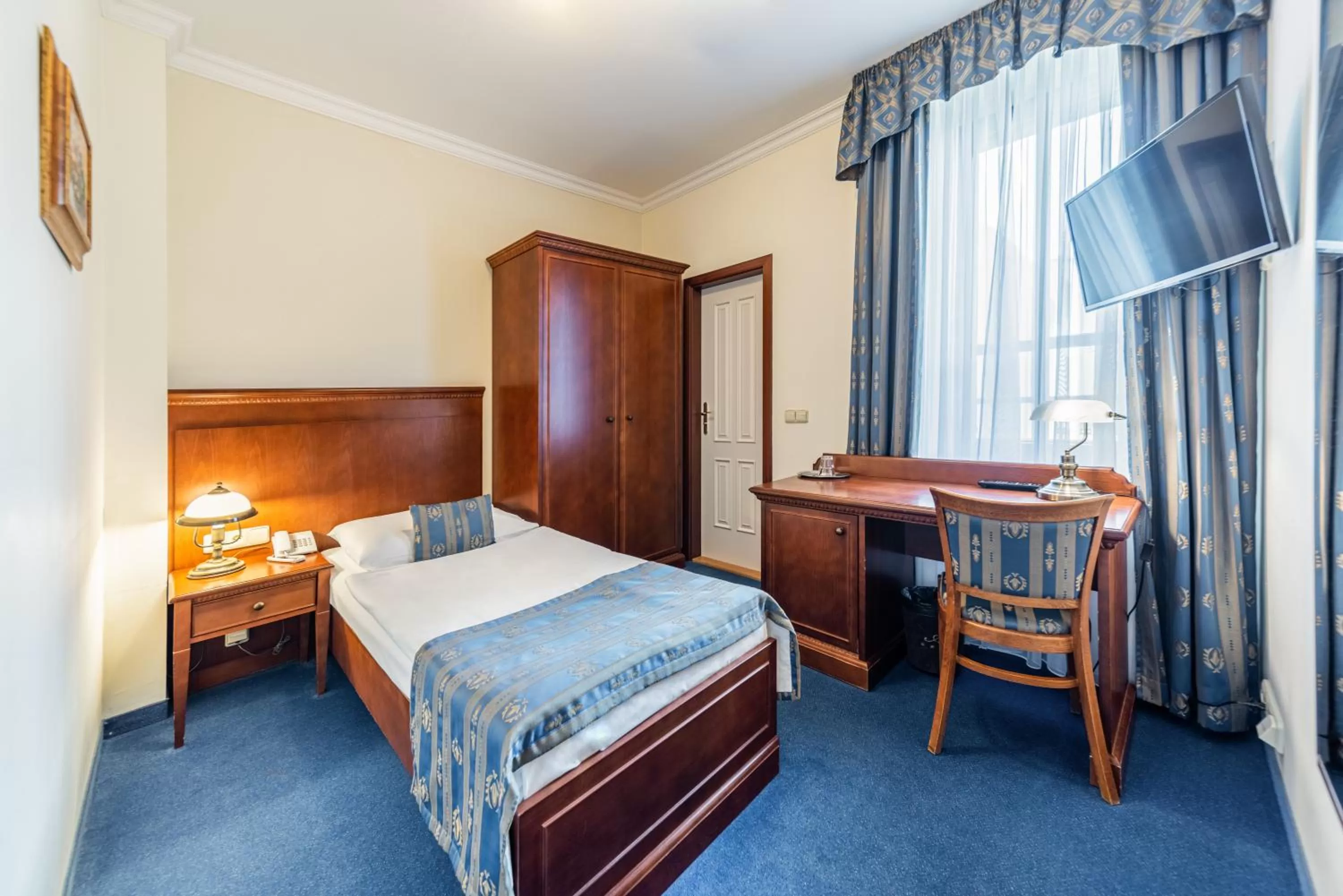 Bedroom in Arkada Hotel Praha