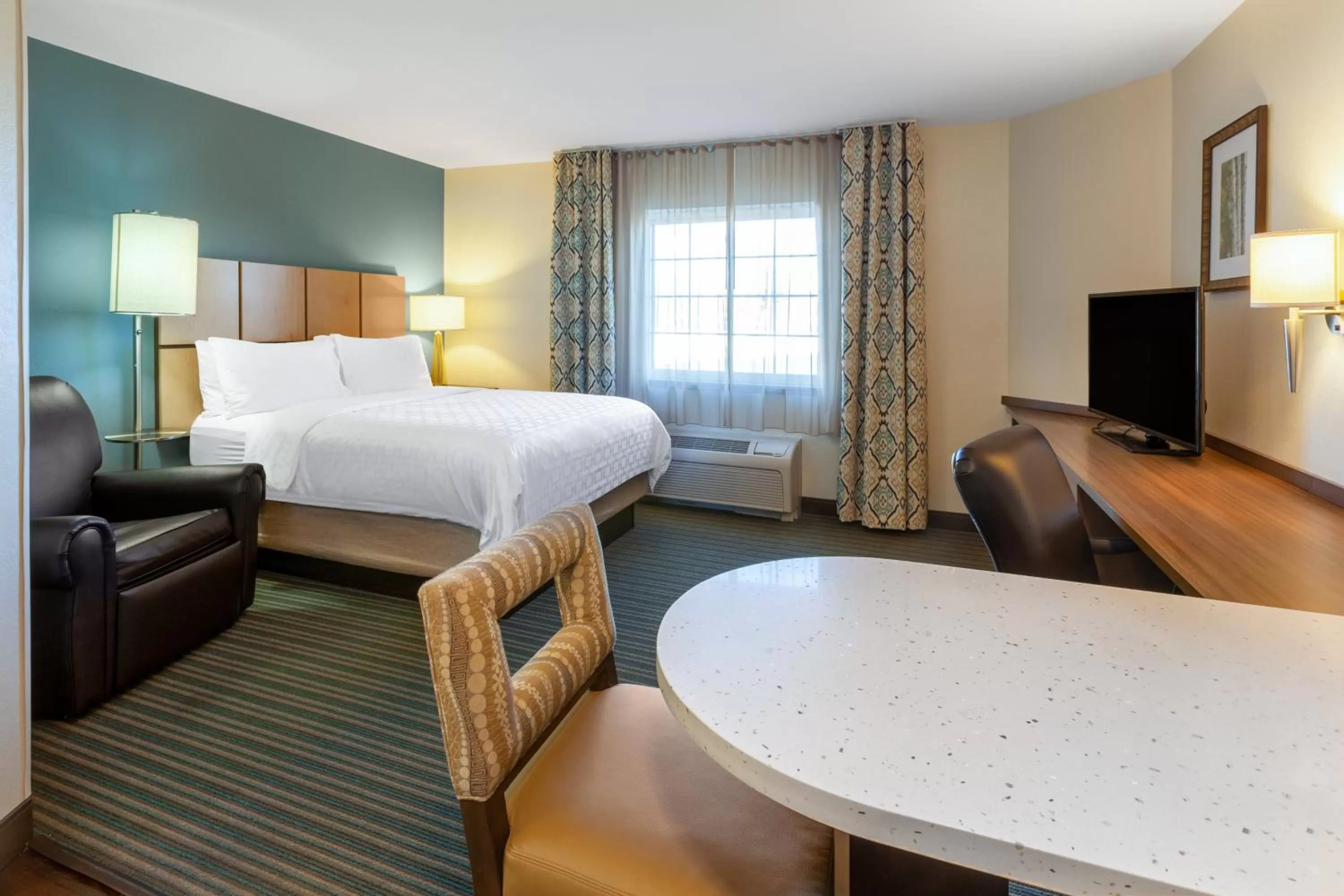 Photo of the whole room, Bed in Candlewood Suites-West Springfield by IHG