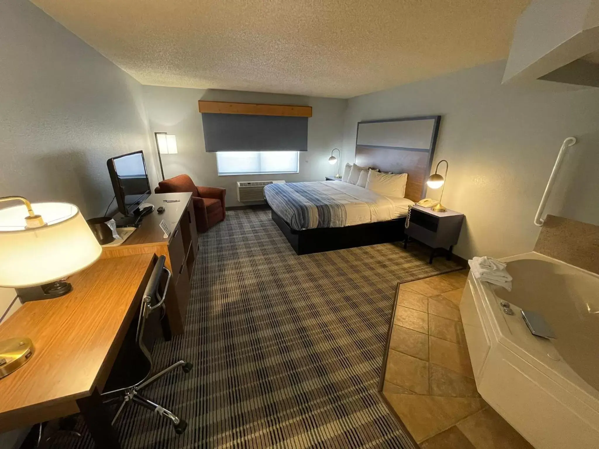 Photo of the whole room in AmericInn by Wyndham Sayre