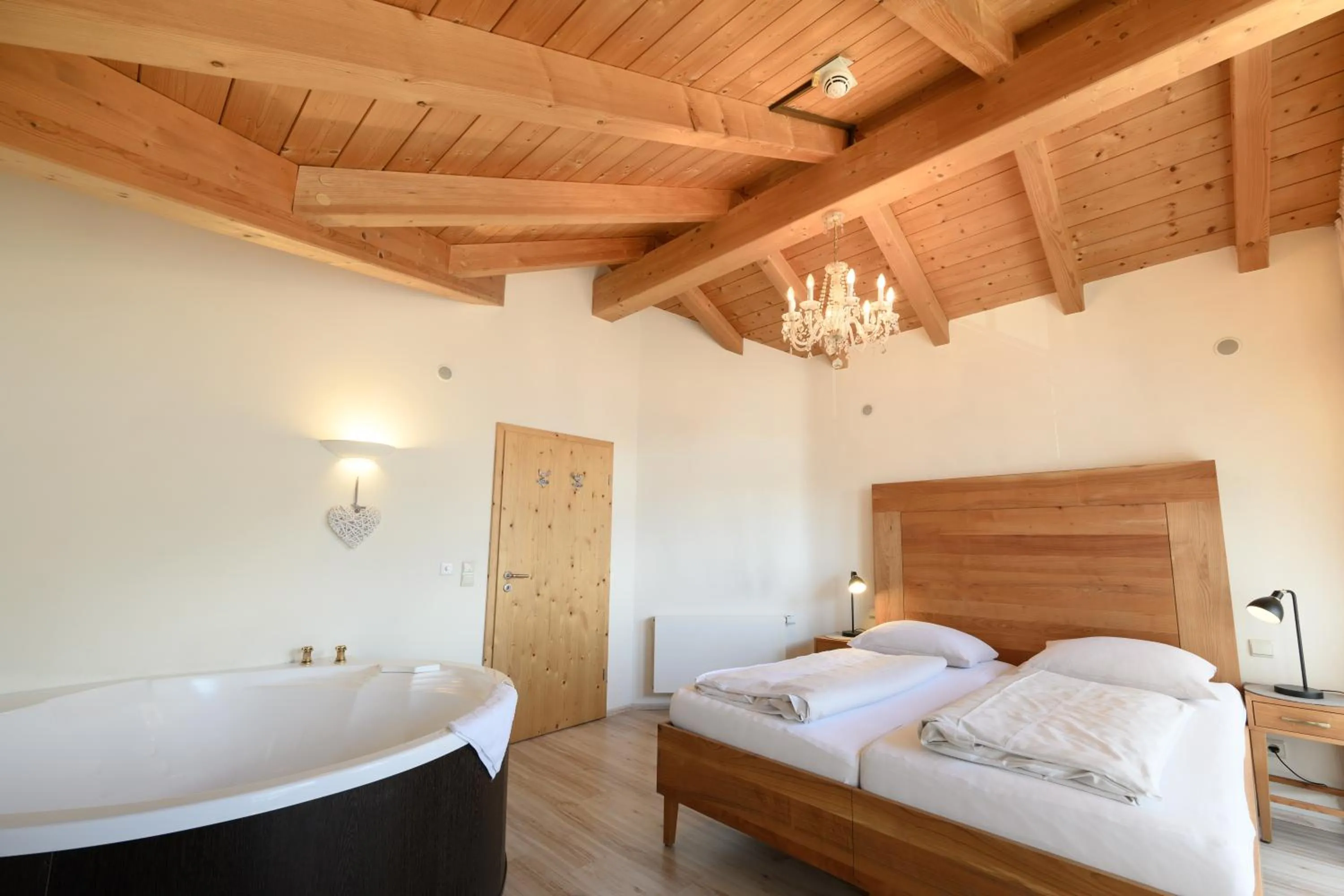 Photo of the whole room, Bed in Biohotel Garmischer Hof