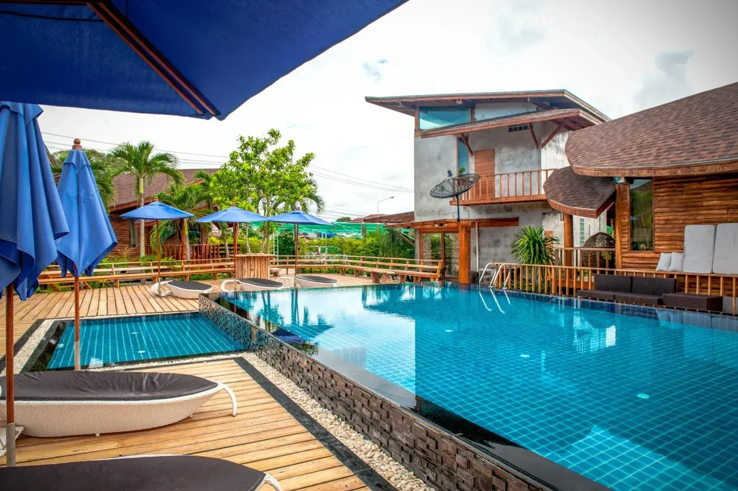 Property building, Swimming Pool in Tique Series Boutique Resort