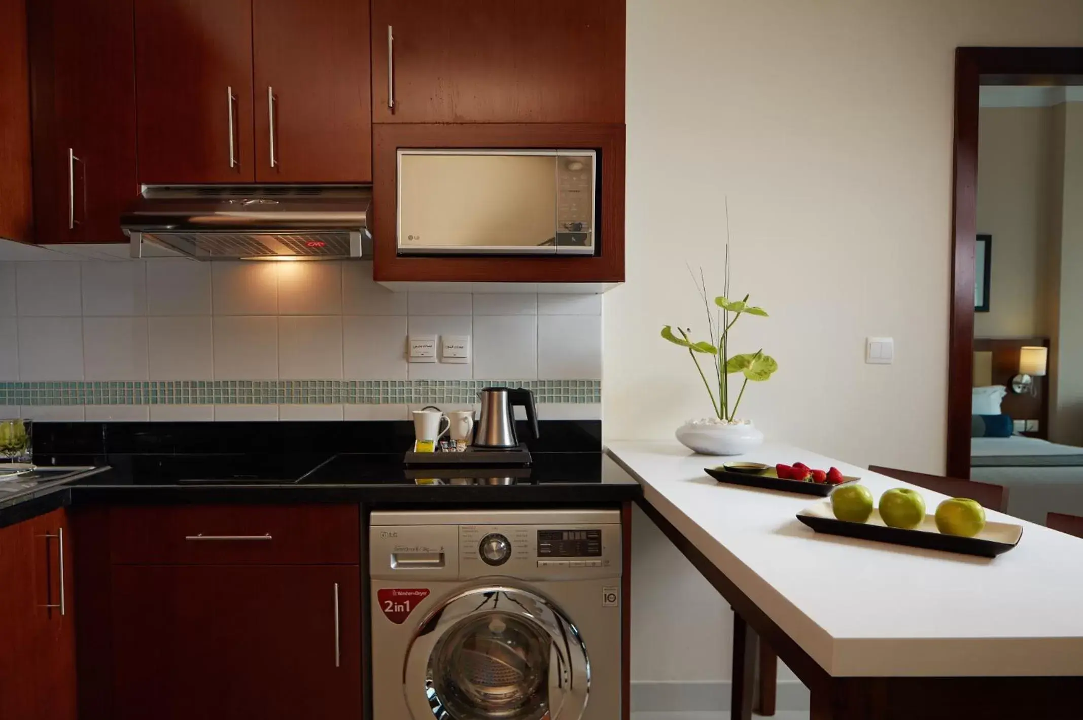 Kitchen or kitchenette, Kitchen/Kitchenette in Treppan Hotel & Suites By Fakhruddin