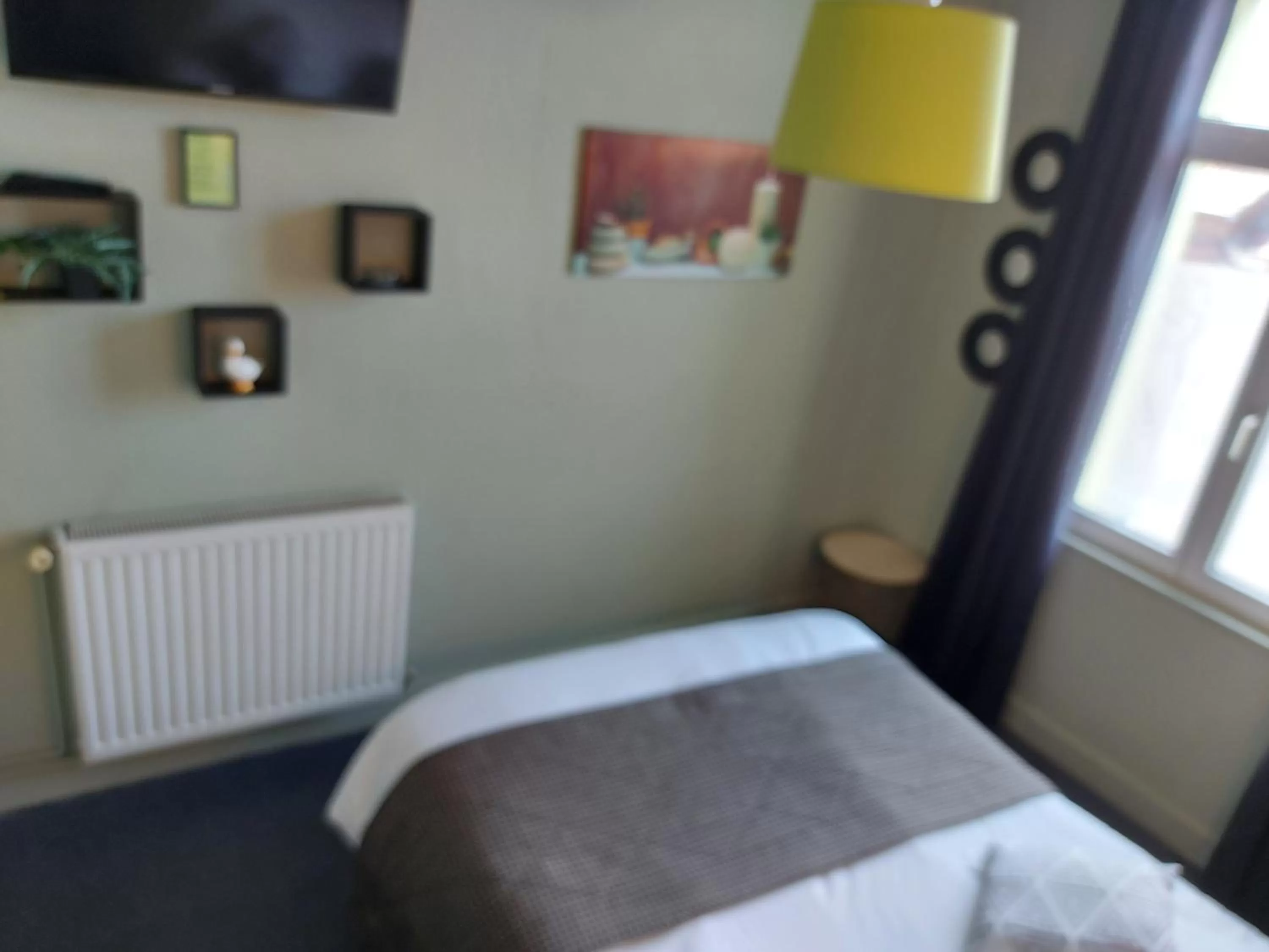 Bed in Hotel De La Paix