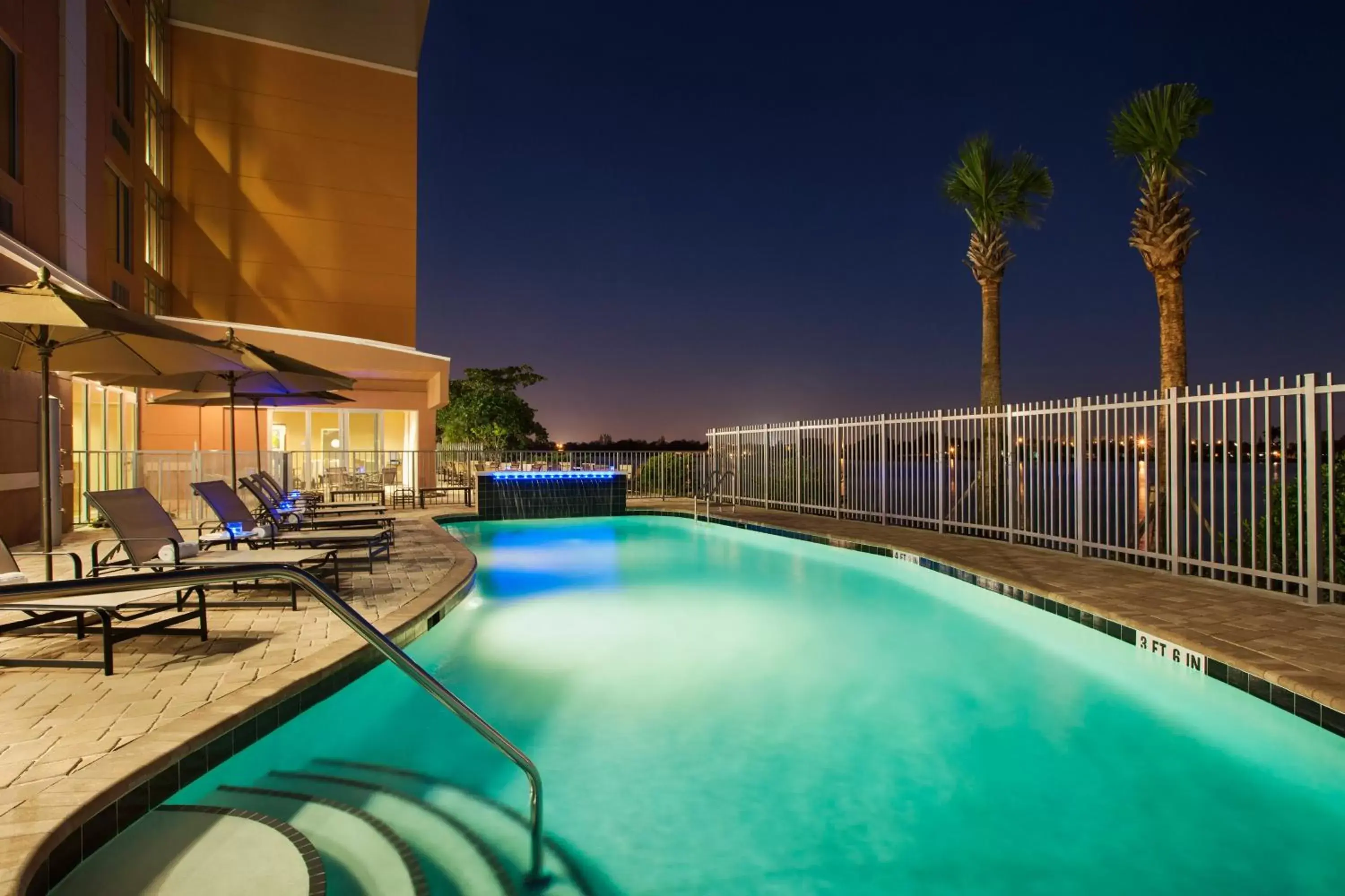 Patio, Swimming Pool in Cambria Hotel Miami Airport - Blue Lagoon