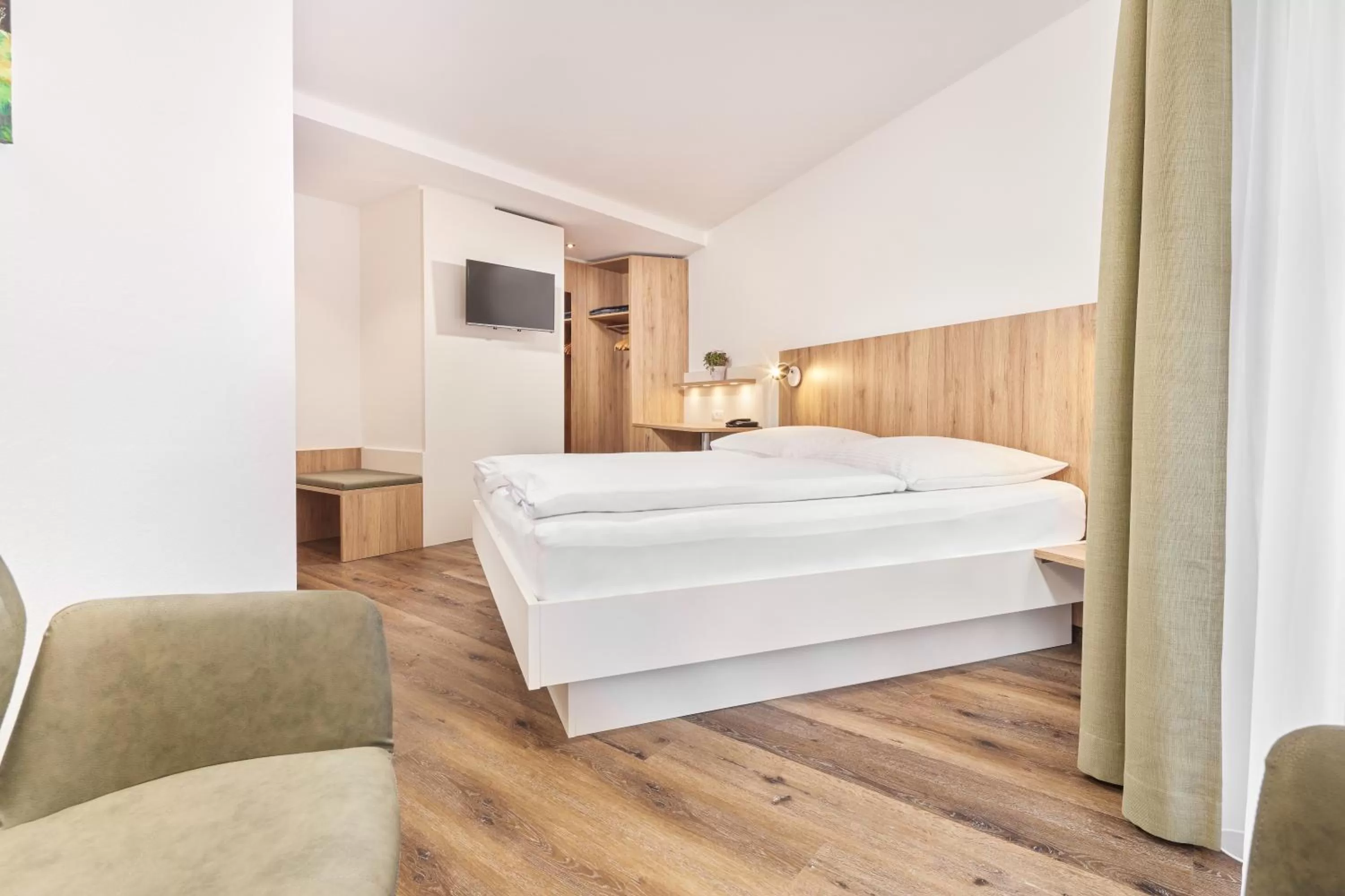 Photo of the whole room, Bed in Hotel Garni Gästehaus am Mühlbach