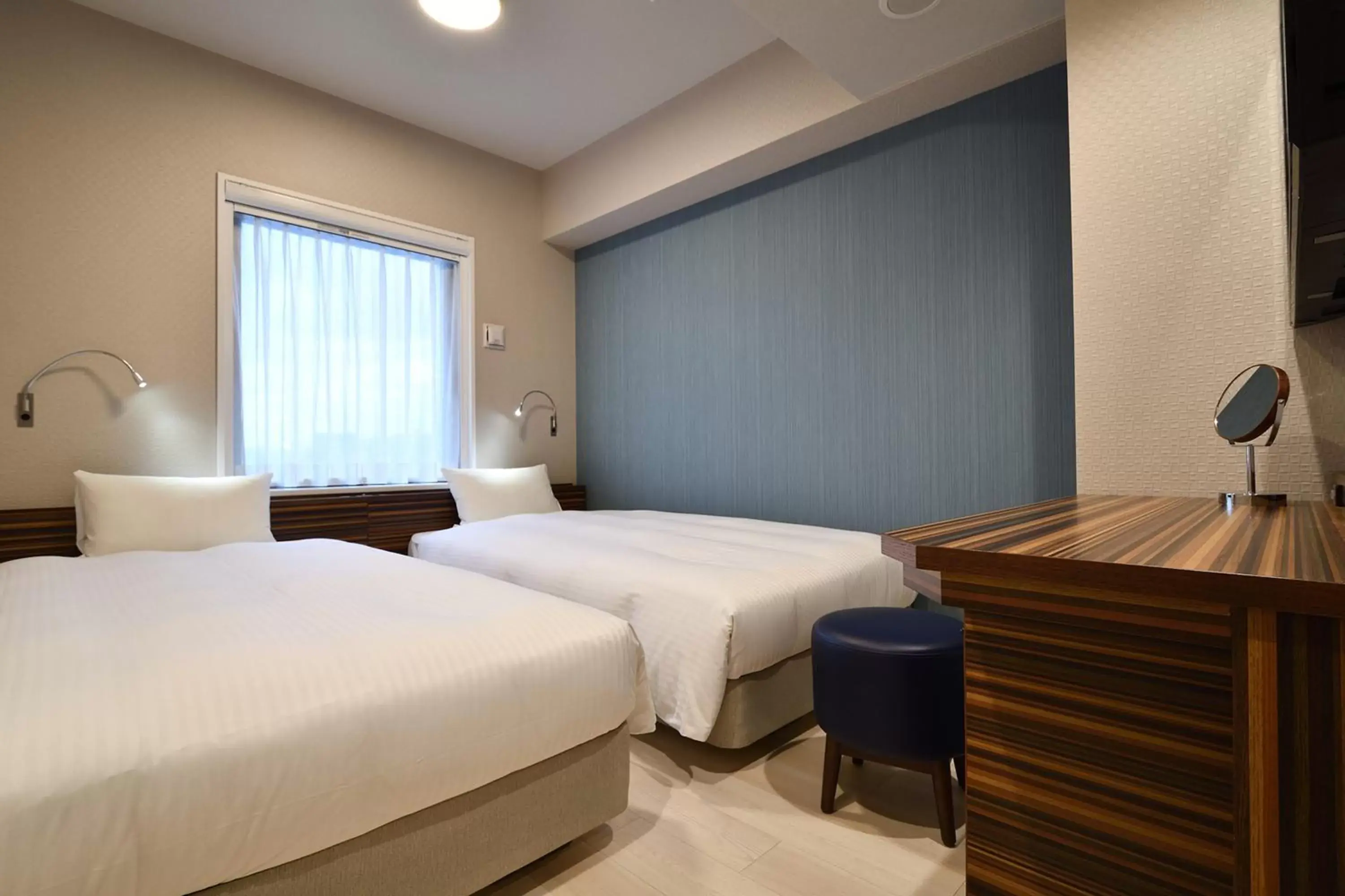 Photo of the whole room, Bed in The BREAKFAST HOTEL Fukuoka Nakasu