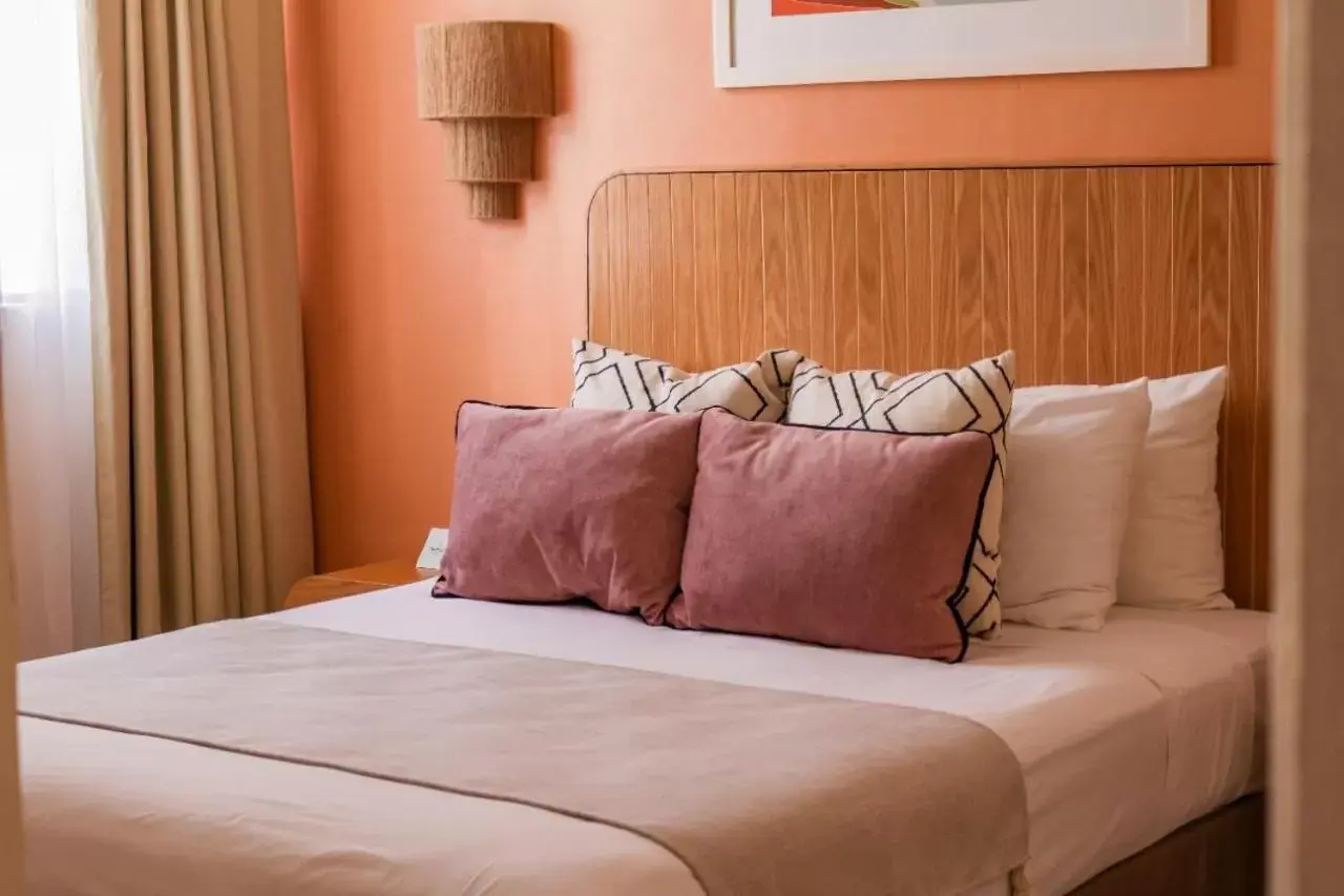 Bed in Hotel Tropicus Boutique