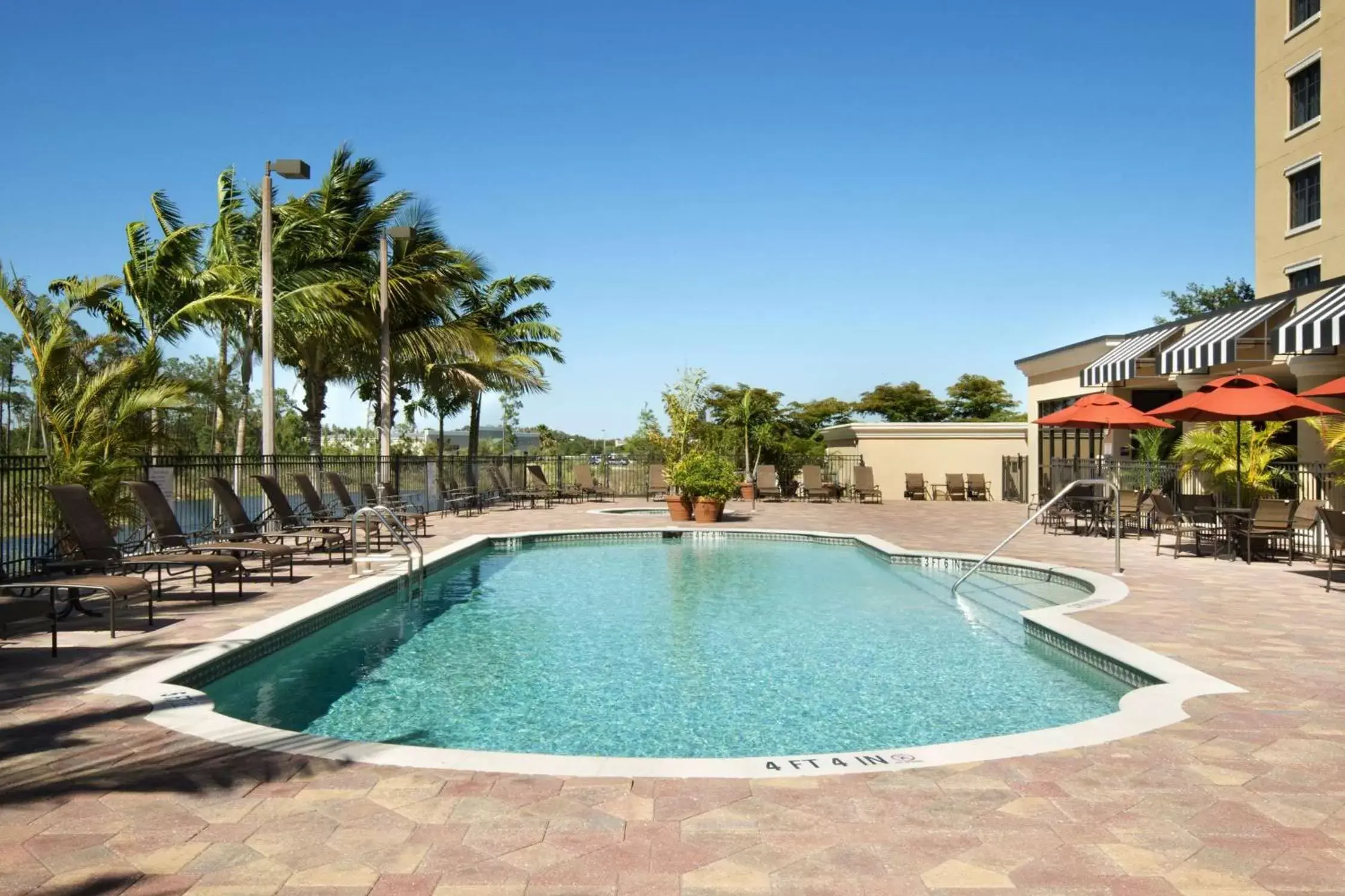 Pool view, Swimming Pool in Embassy Suites Fort Myers - Estero