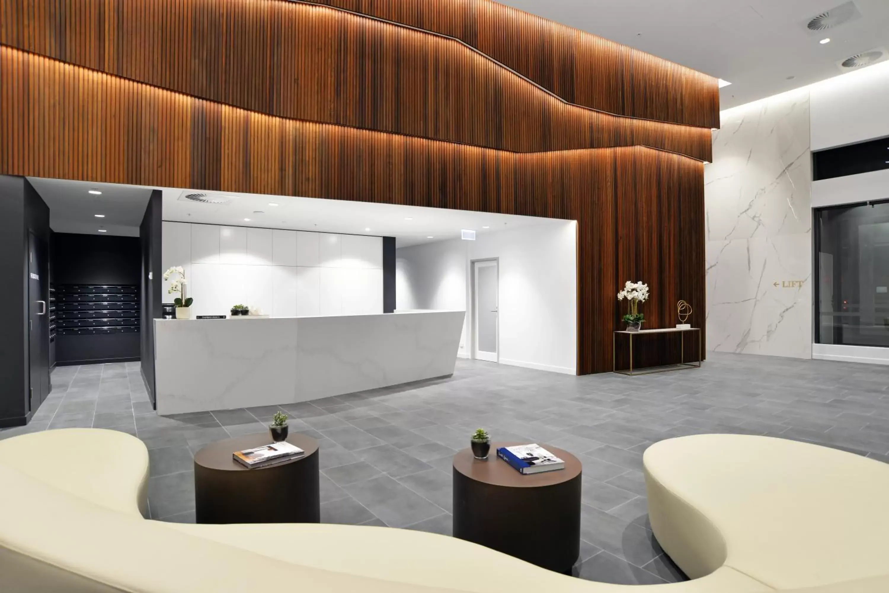 Lobby or reception, Seating Area in Brisbane One Apartments by CLLIX