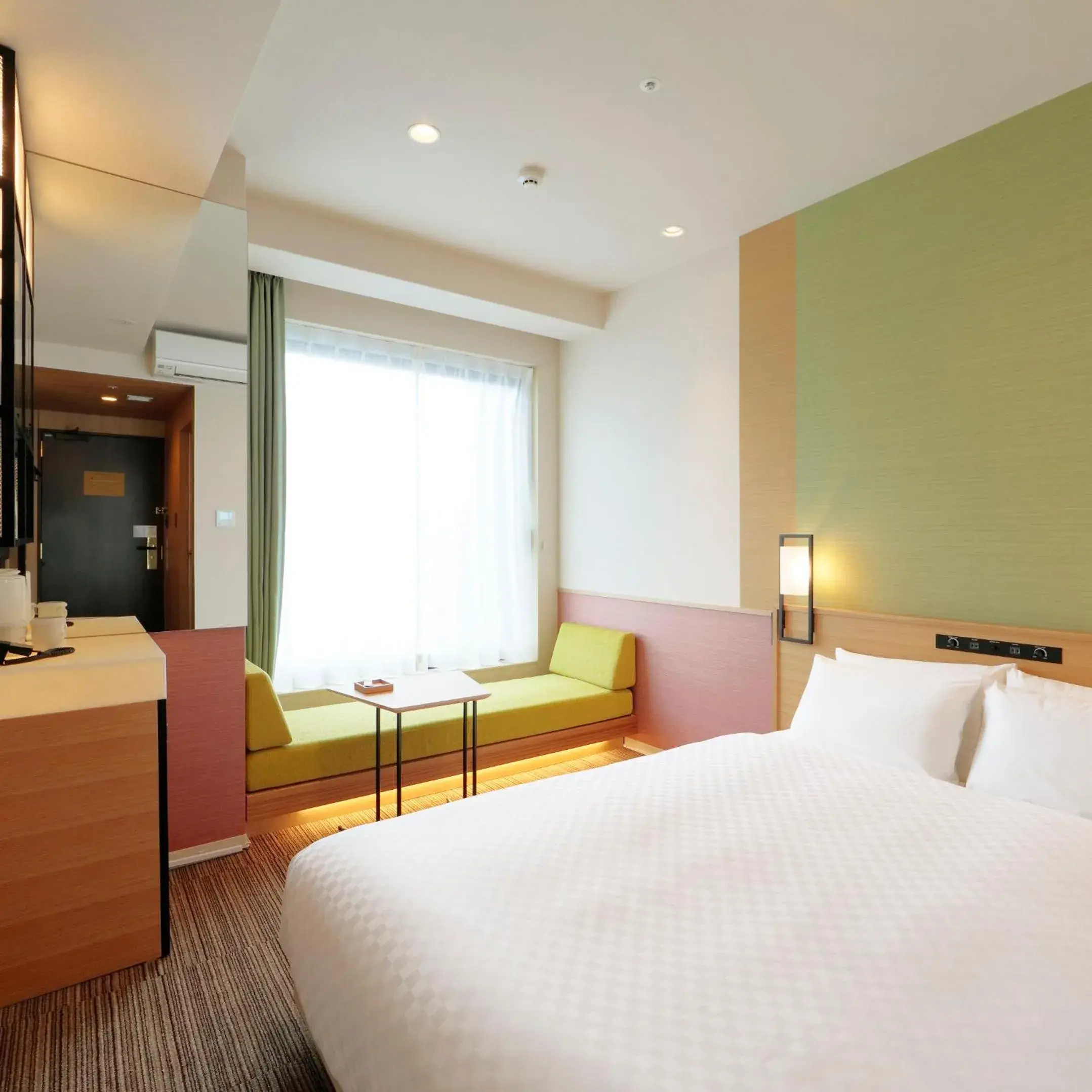 Bed in Candeo Hotels Osaka Kishibe
