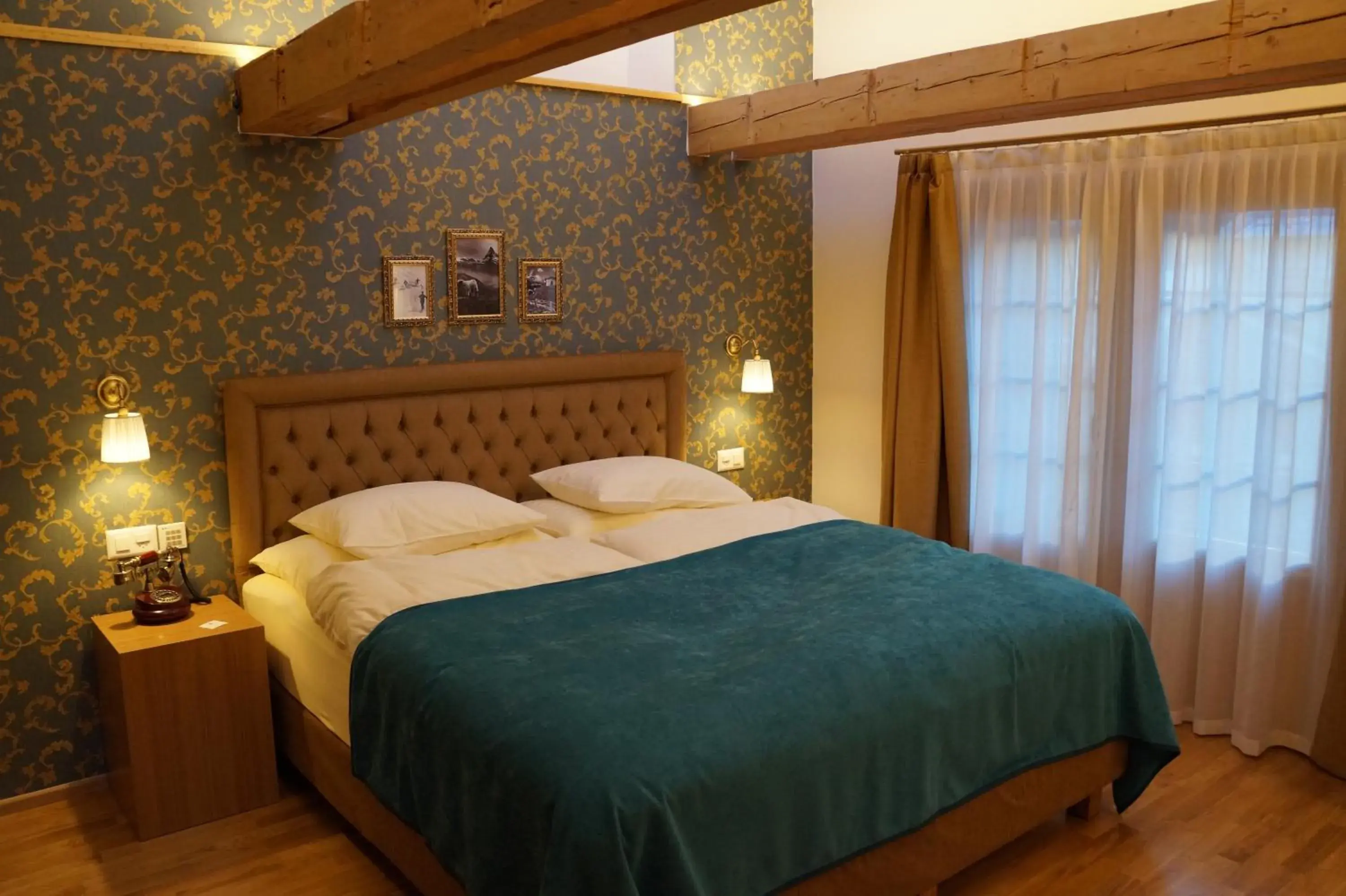 Photo of the whole room, Bed in Hotel Walliserhof Zermatt