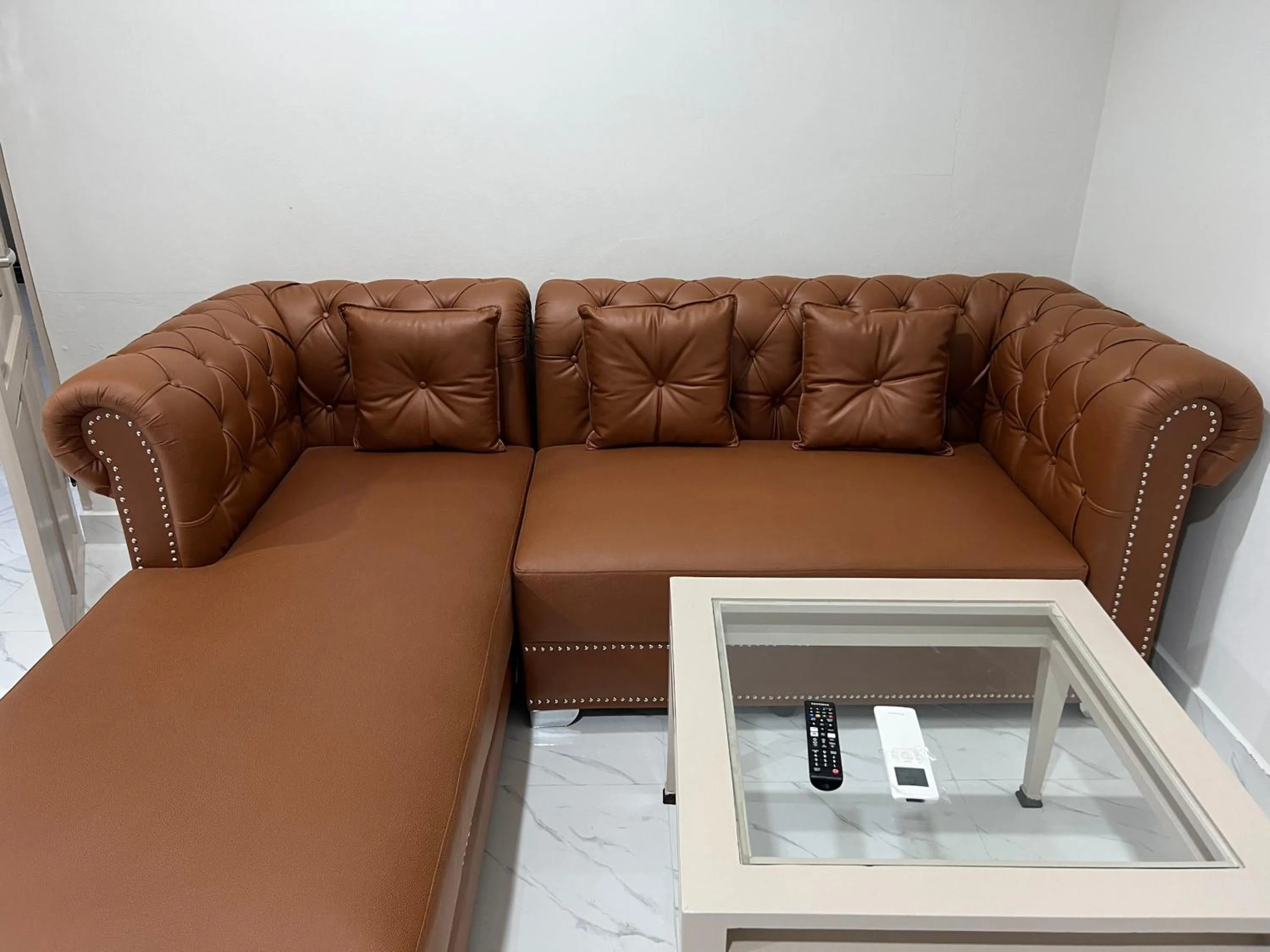 Seating area in Mall Suites Hotel