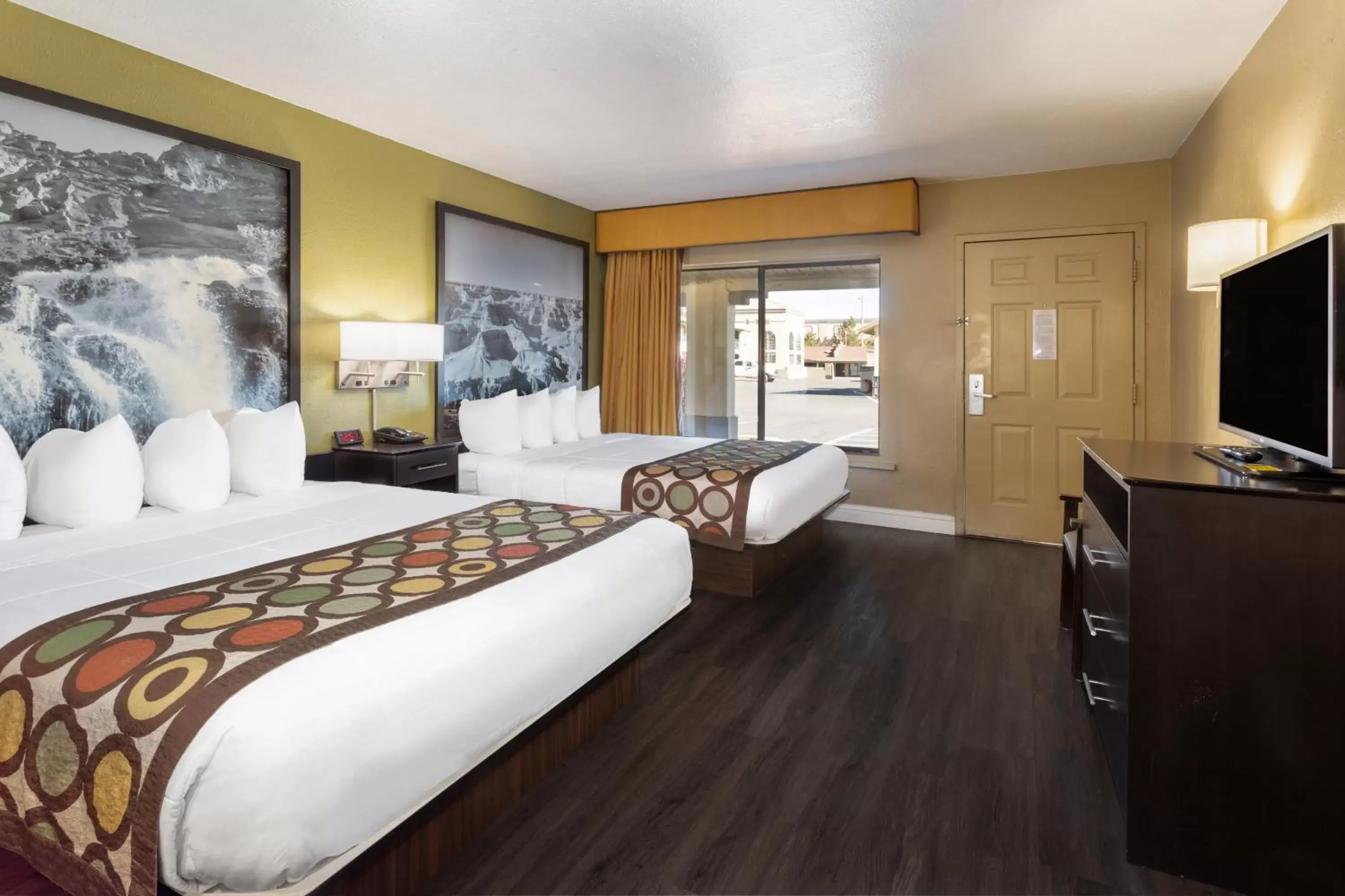 Bedroom in Super 8 by Wyndham NAU/Downtown Conference Center