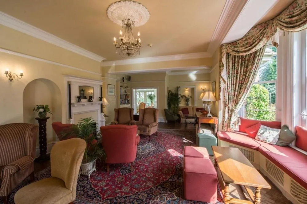 Communal lounge/ TV room in The Old Vicarage