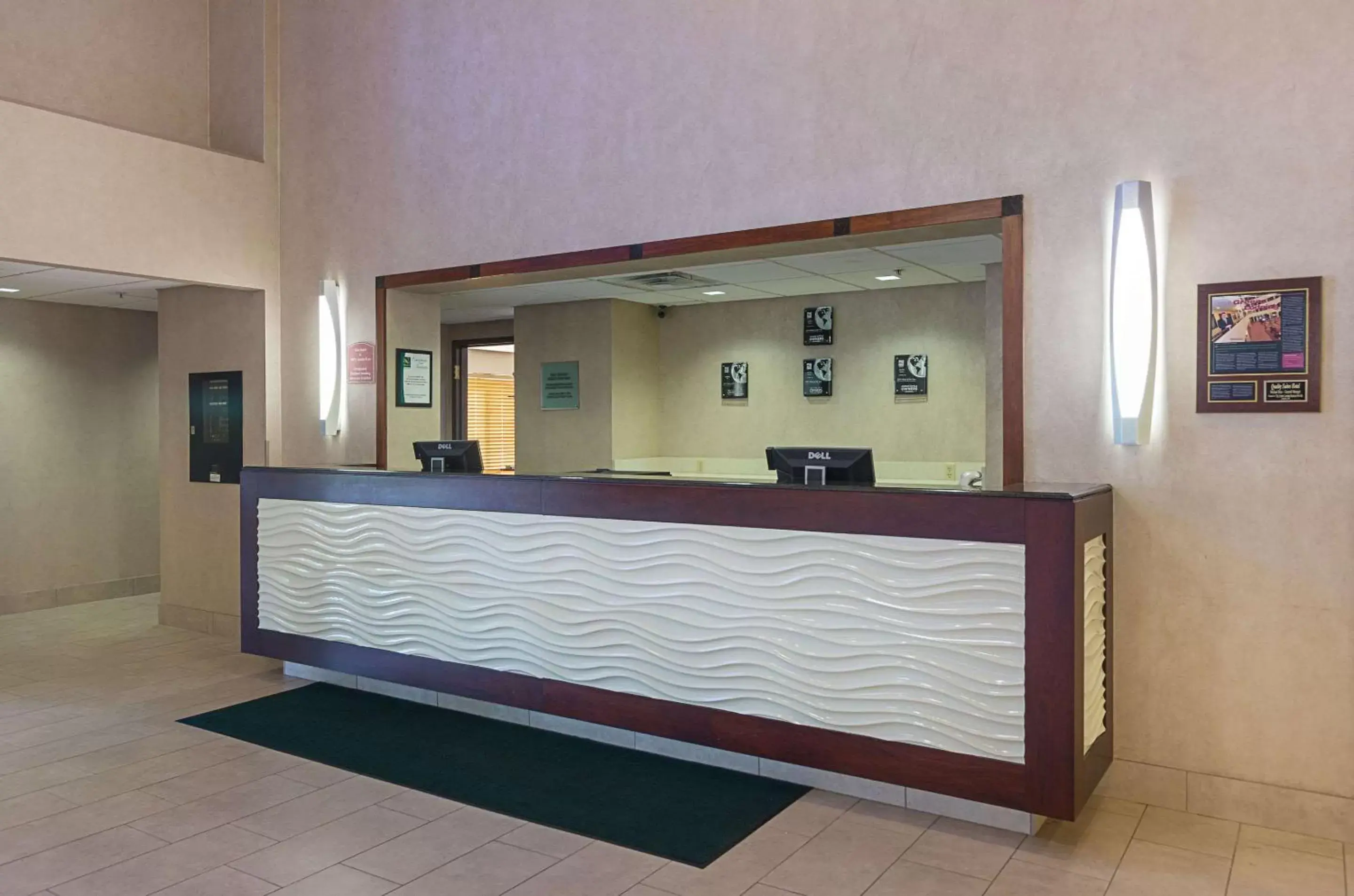 Lobby or reception in Quality Suites Lansing West Lobby or reception in Quality Suites Lansing West