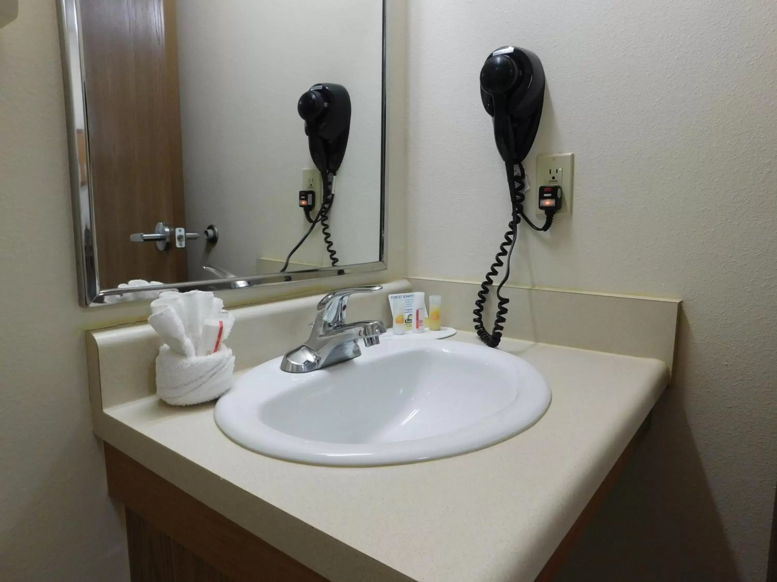 Bathroom in Days Inn & Suites by Wyndham Rochester South