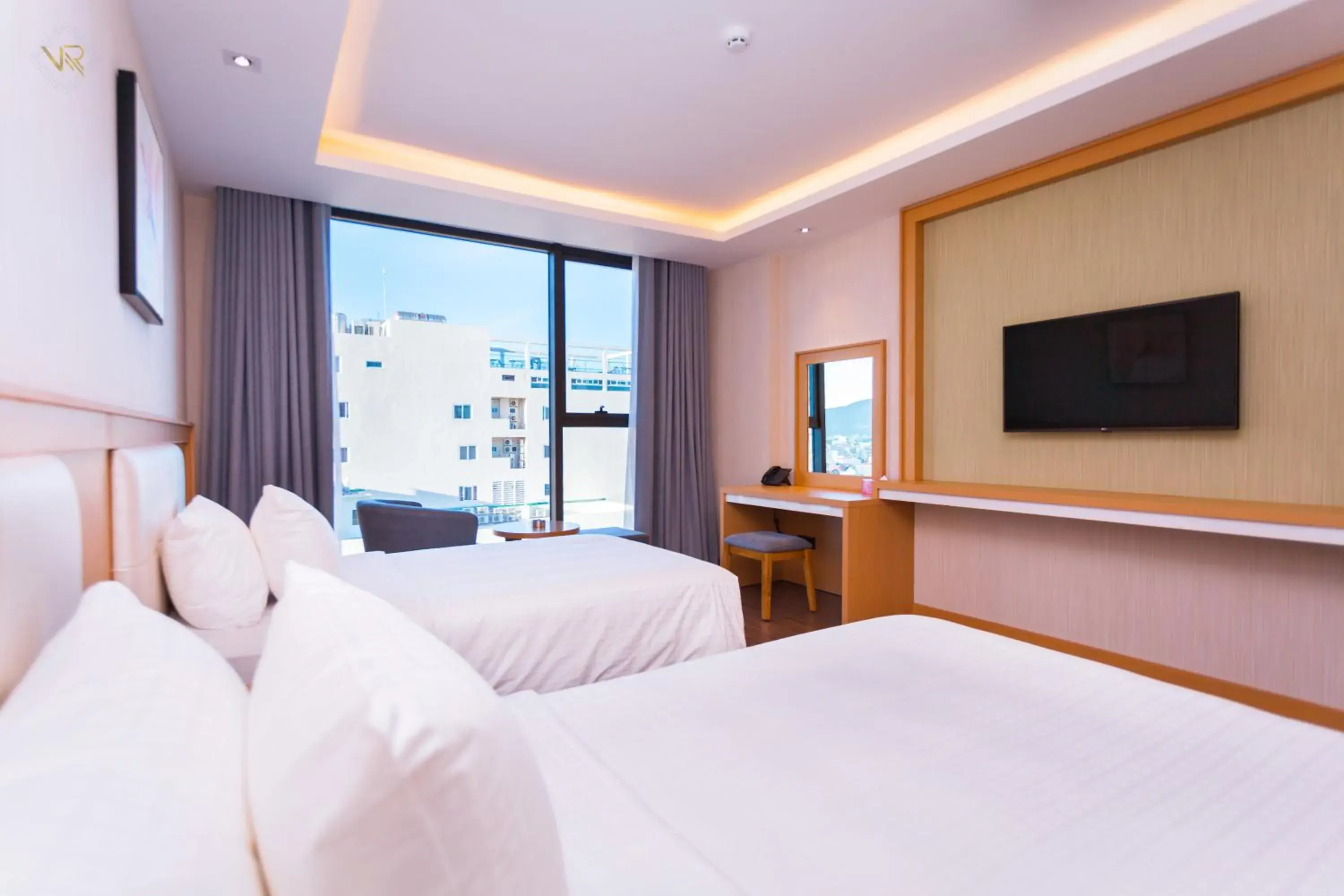 Bed in VUNG TAU RIVA HOTEL