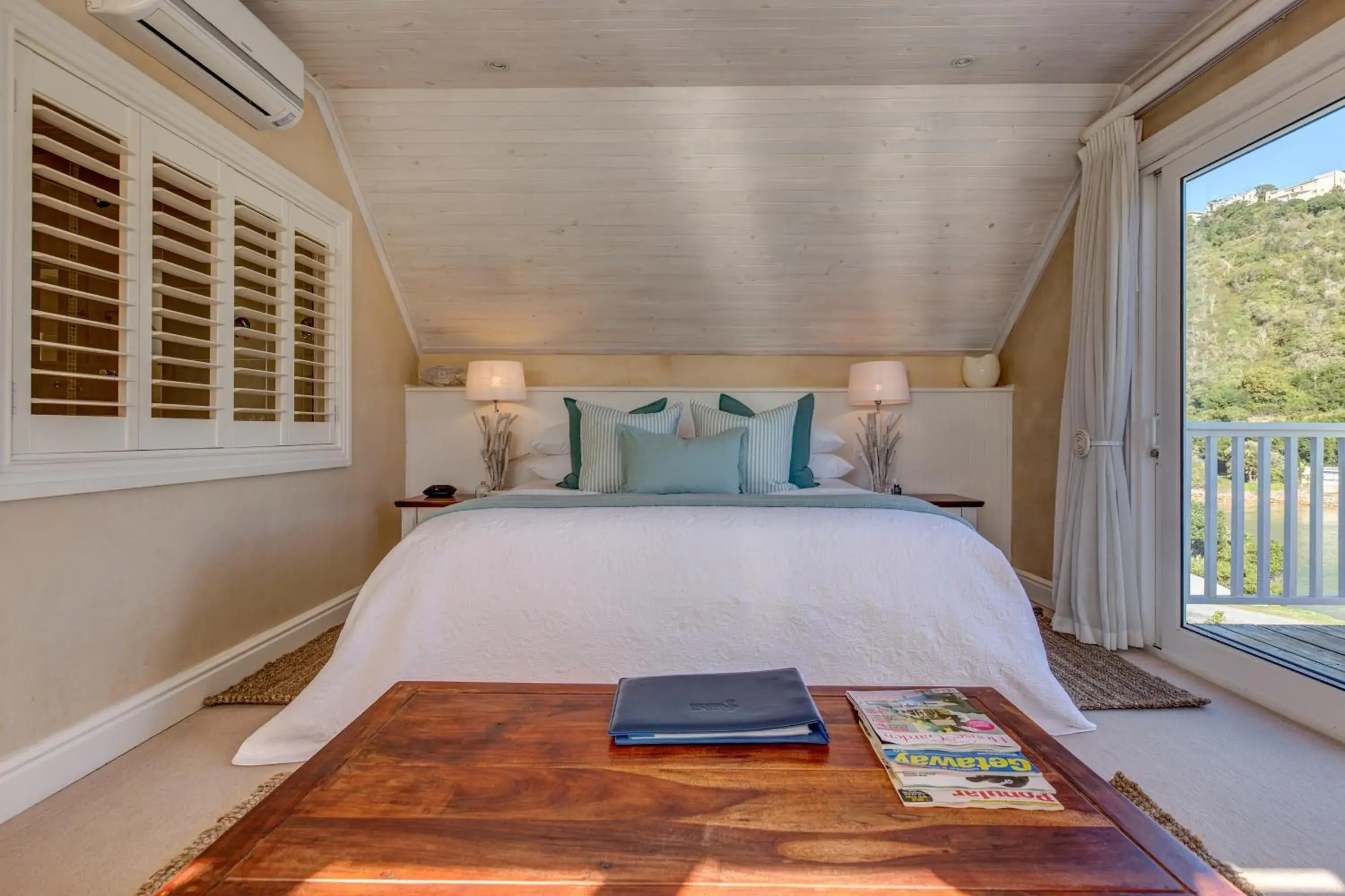 Bed in Amanzi Island Boutique Hotel