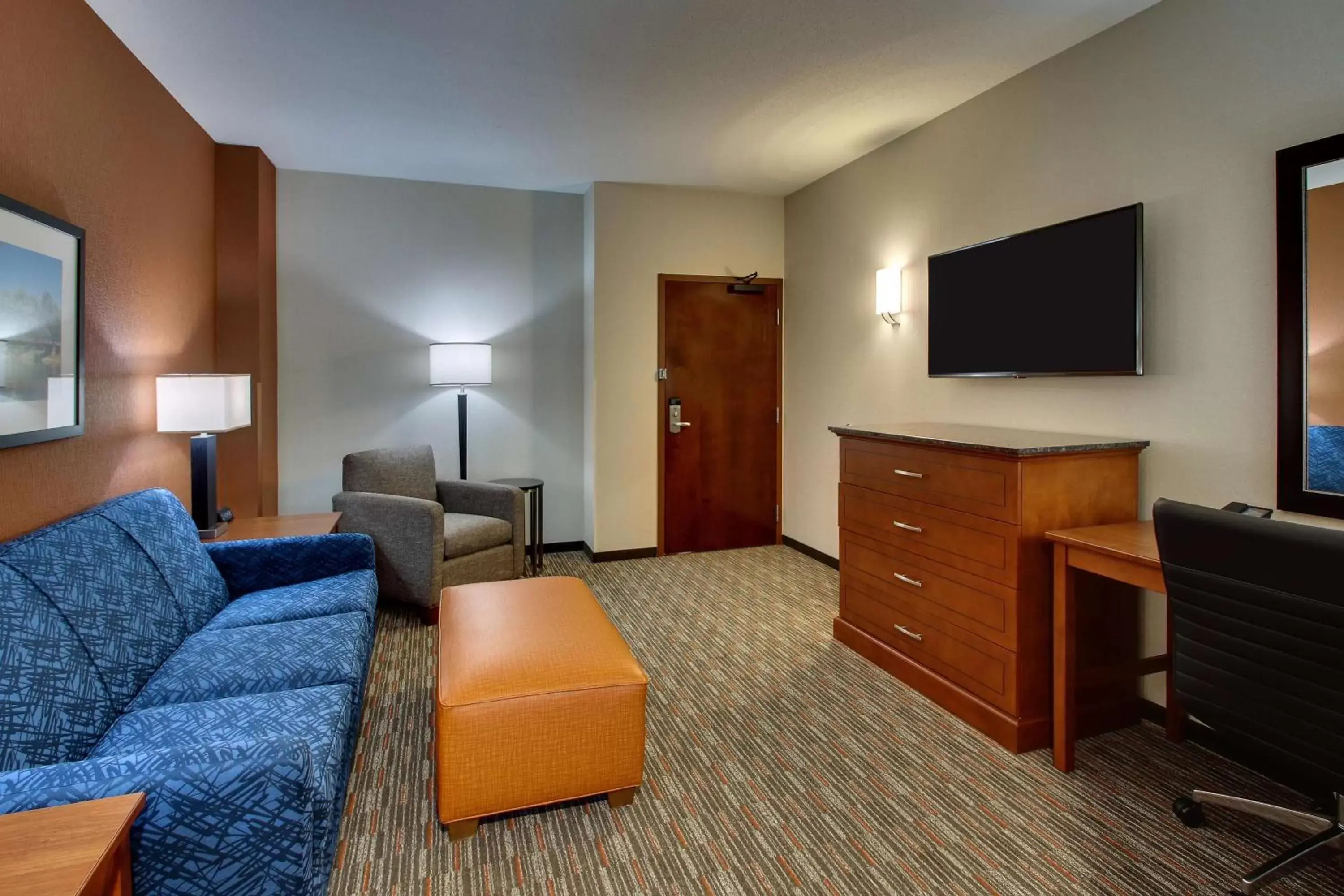 Photo of the whole room, TV/Entertainment Center in Drury Inn & Suites Iowa City Coralville