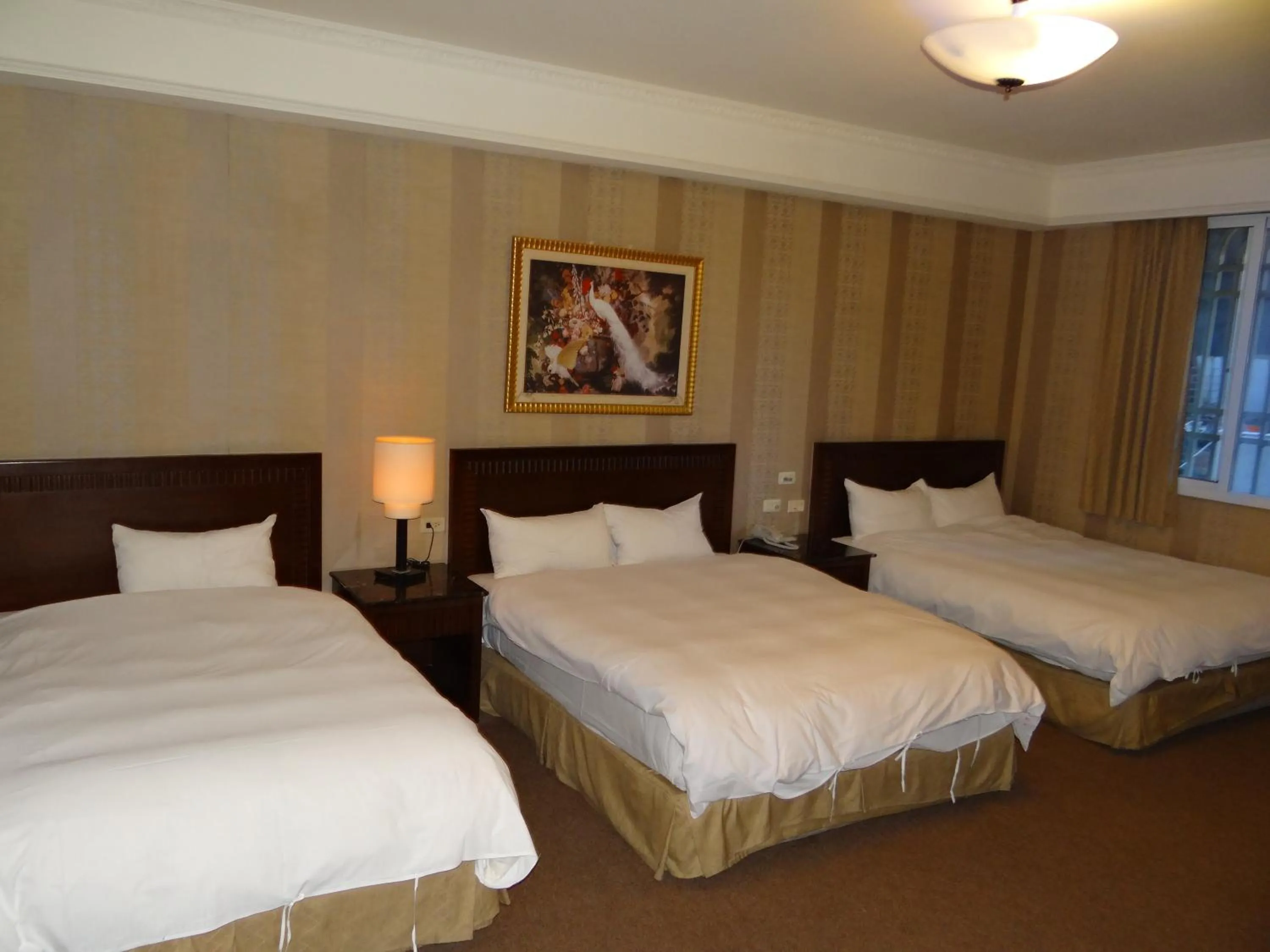 Bedroom, Bed in Wuzhou Hotel