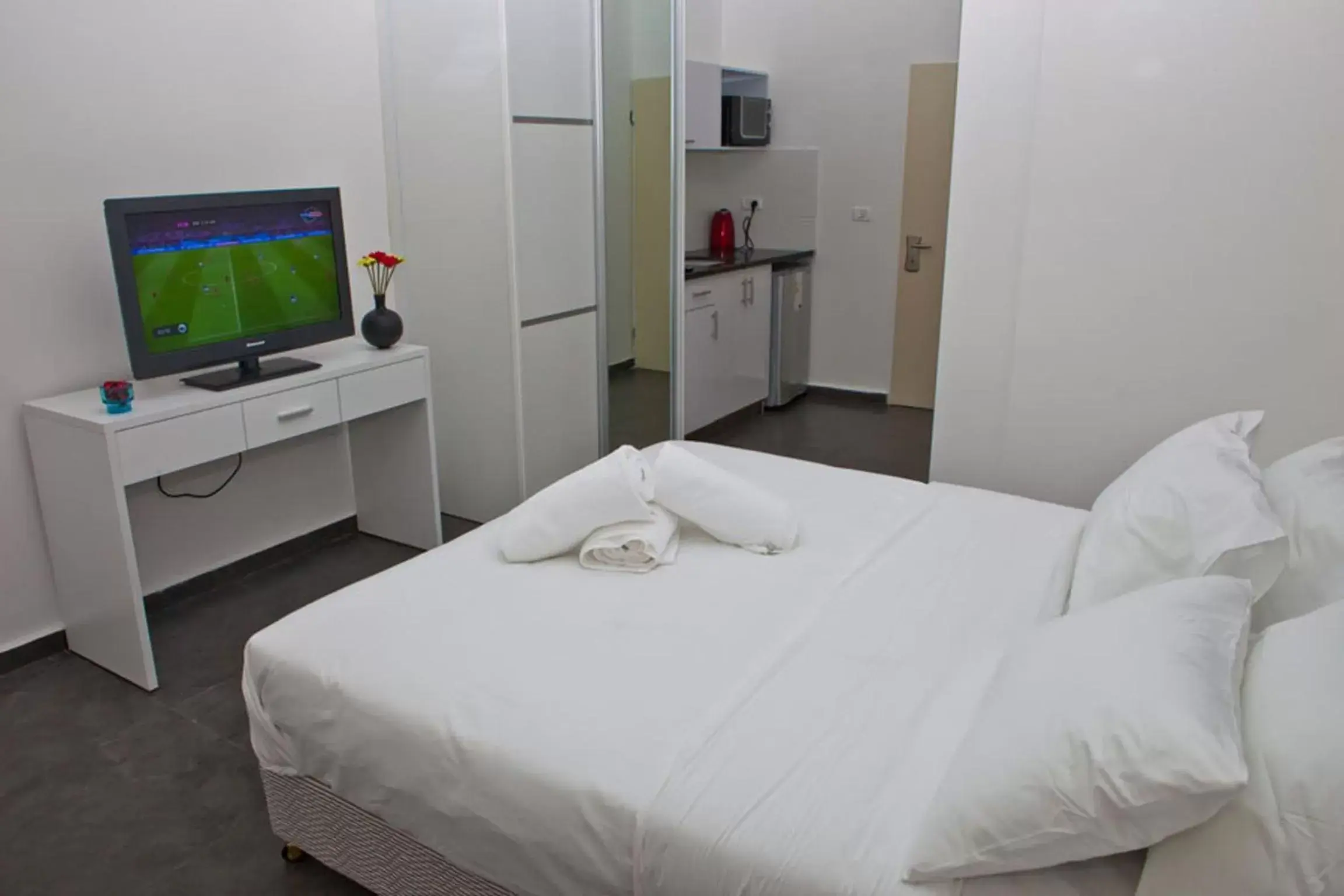 Photo of the whole room, Bed in Geula Suites BY RAPHAEL HOTELS Photo of the whole room, Bed in Geula Suites BY RAPHAEL HOTELS