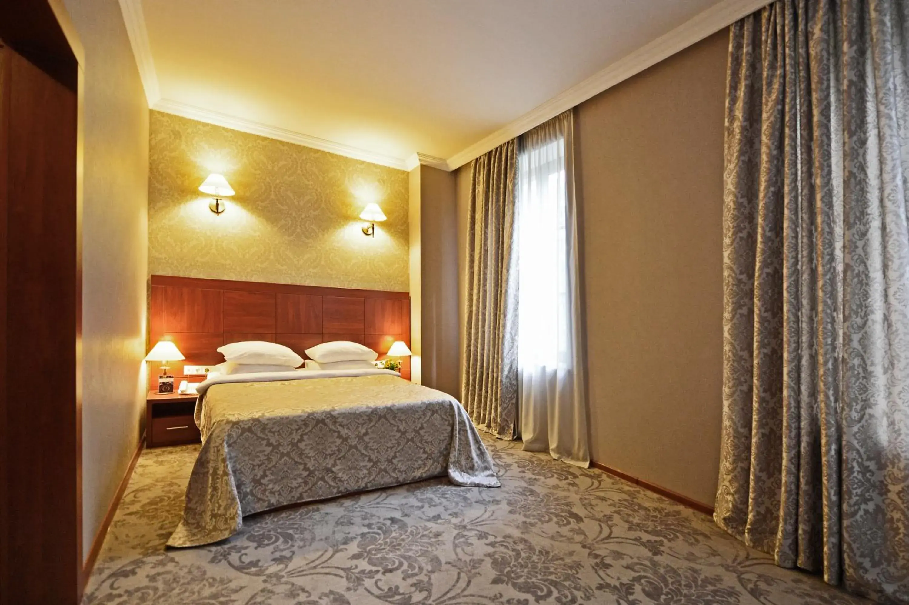 Bed in Hotel Astoria Tbilisi